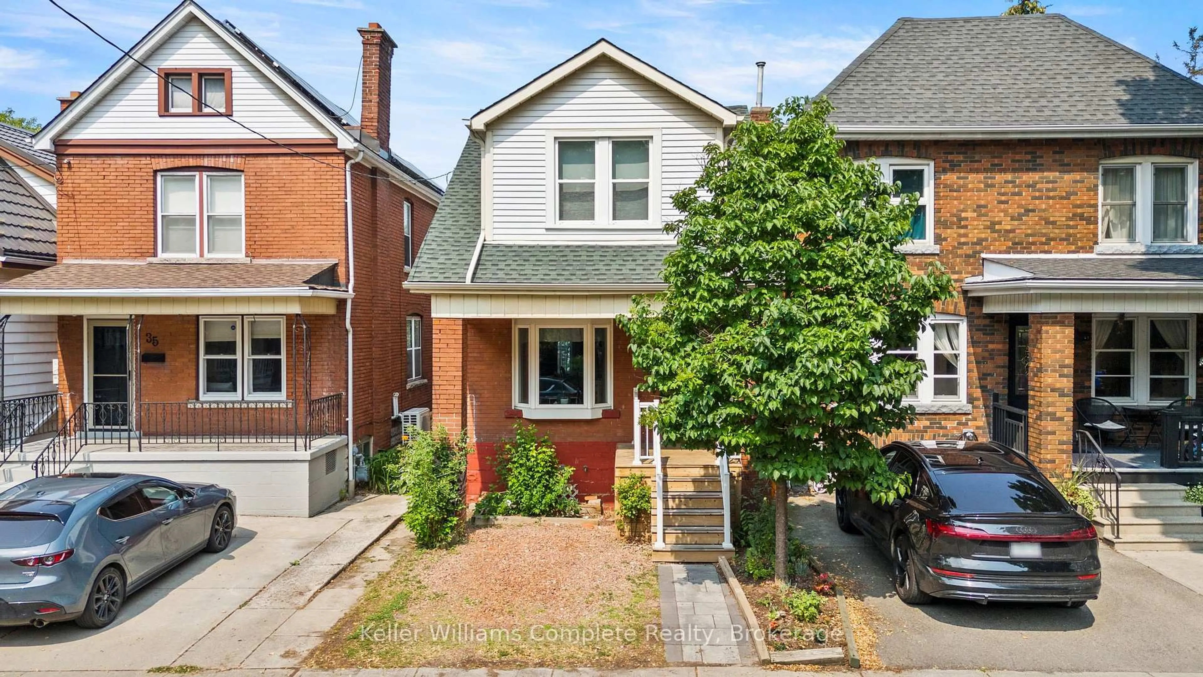 Home with brick exterior material, street for 37 Park Row, Hamilton Ontario L8H 4E3