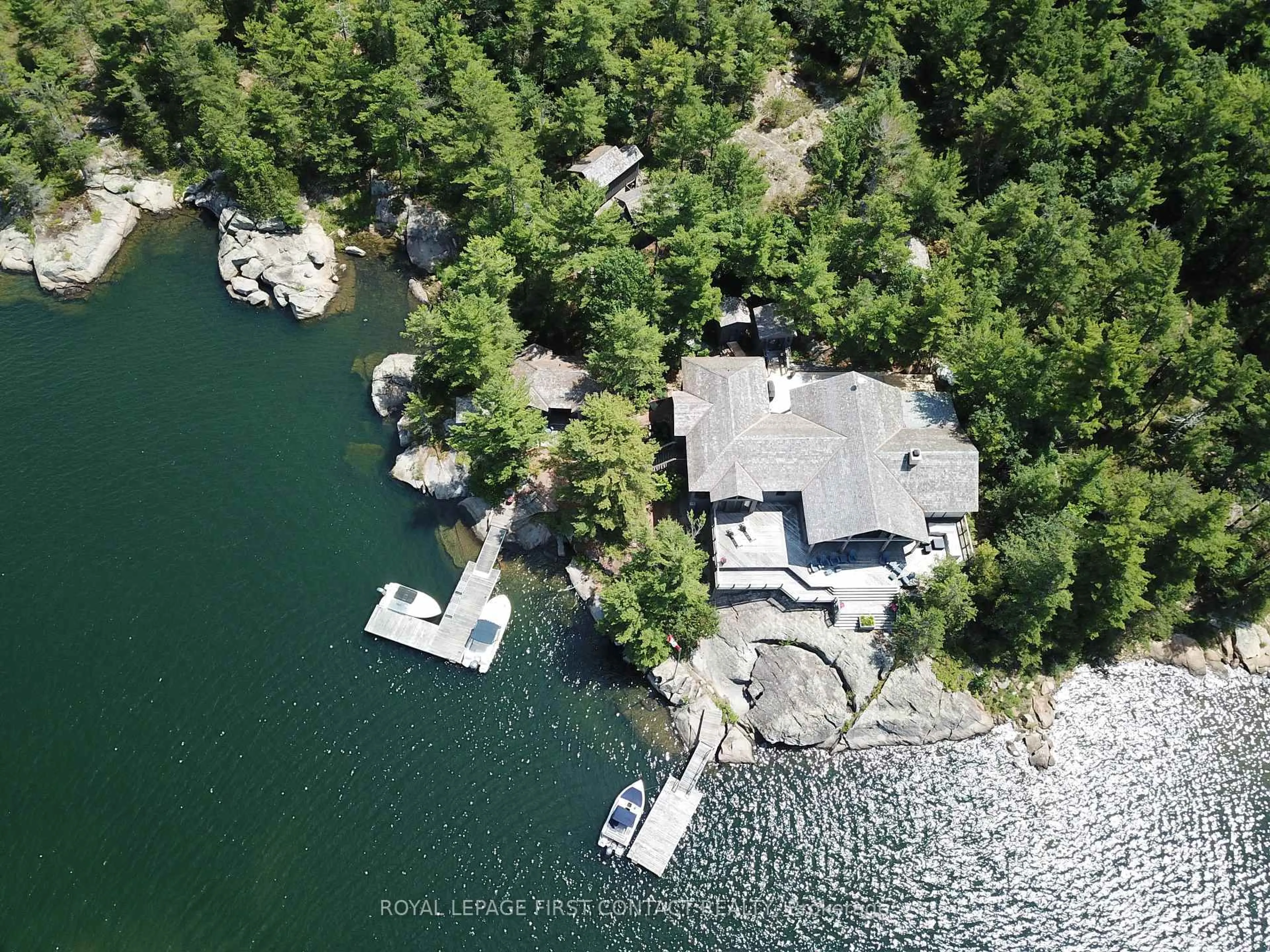 A pic from outside/outdoor area/front of a property/back of a property/a pic from drone, water/lake/river/ocean view for 34 A150 Island, The Archipelago Ontario P0G 1K0