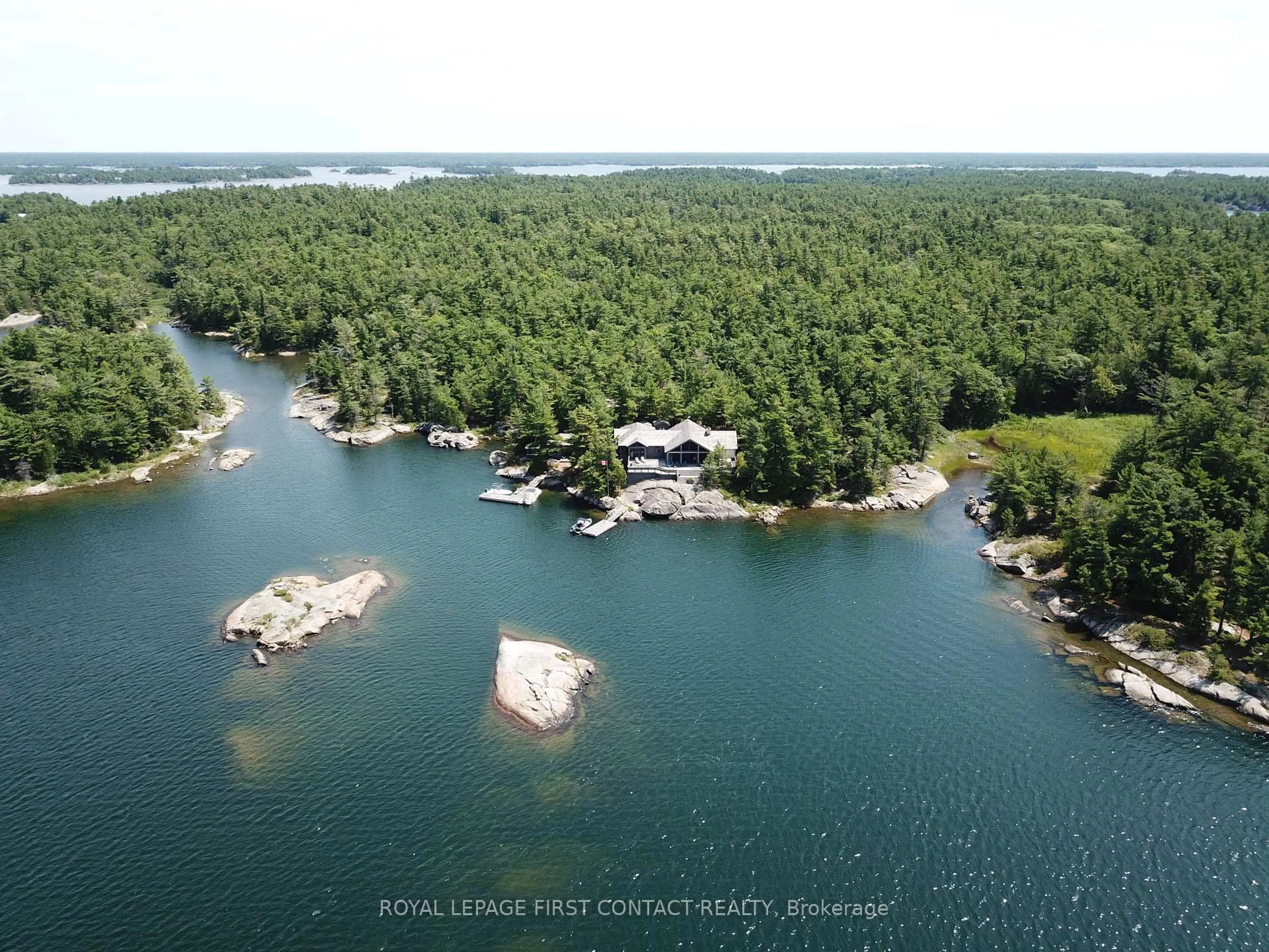 A pic from outside/outdoor area/front of a property/back of a property/a pic from drone, water/lake/river/ocean view for 34 A150 Island, The Archipelago Ontario P0G 1K0