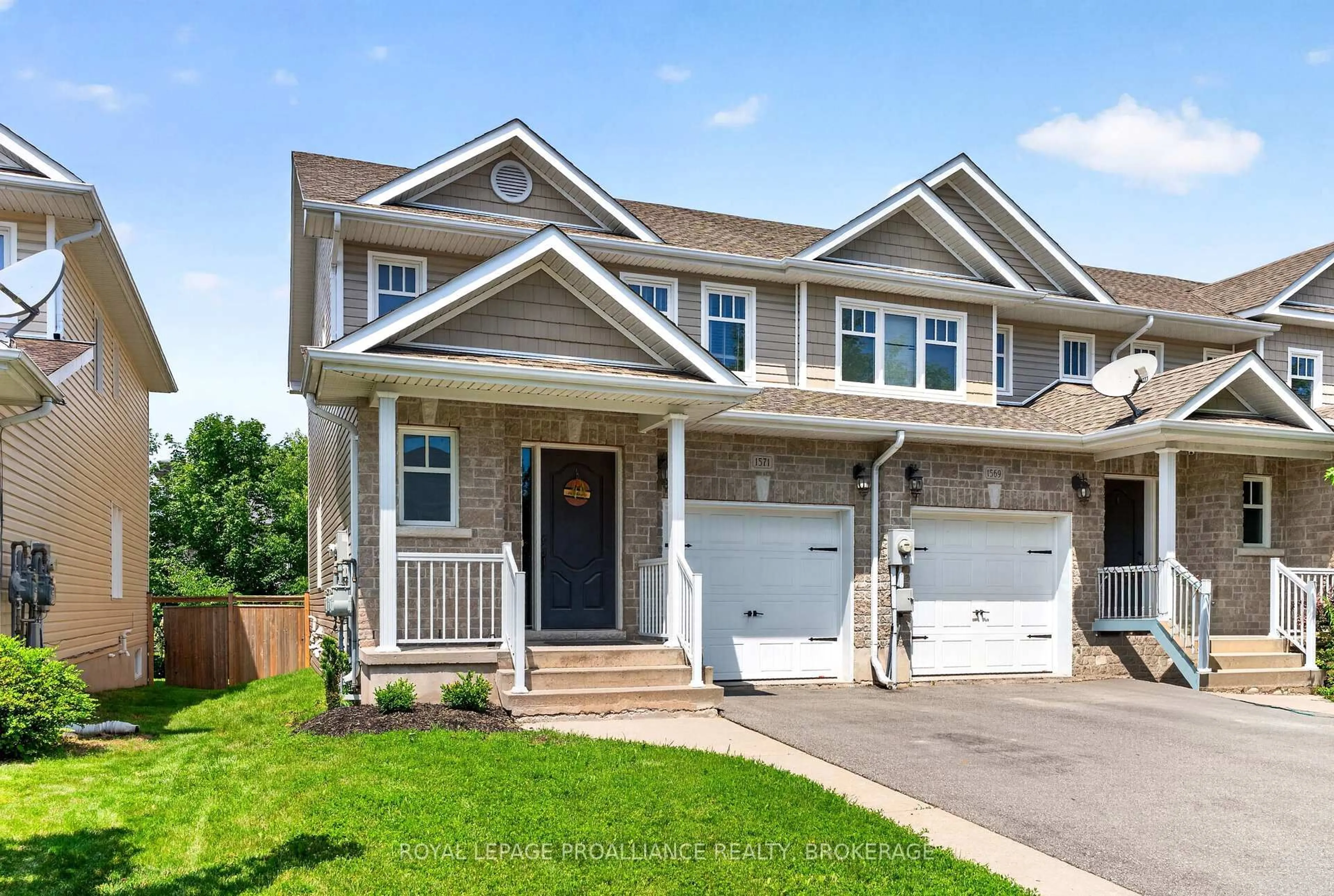 Home with vinyl exterior material, street for 1571 Crimson Cres, Kingston Ontario K7P 0J3