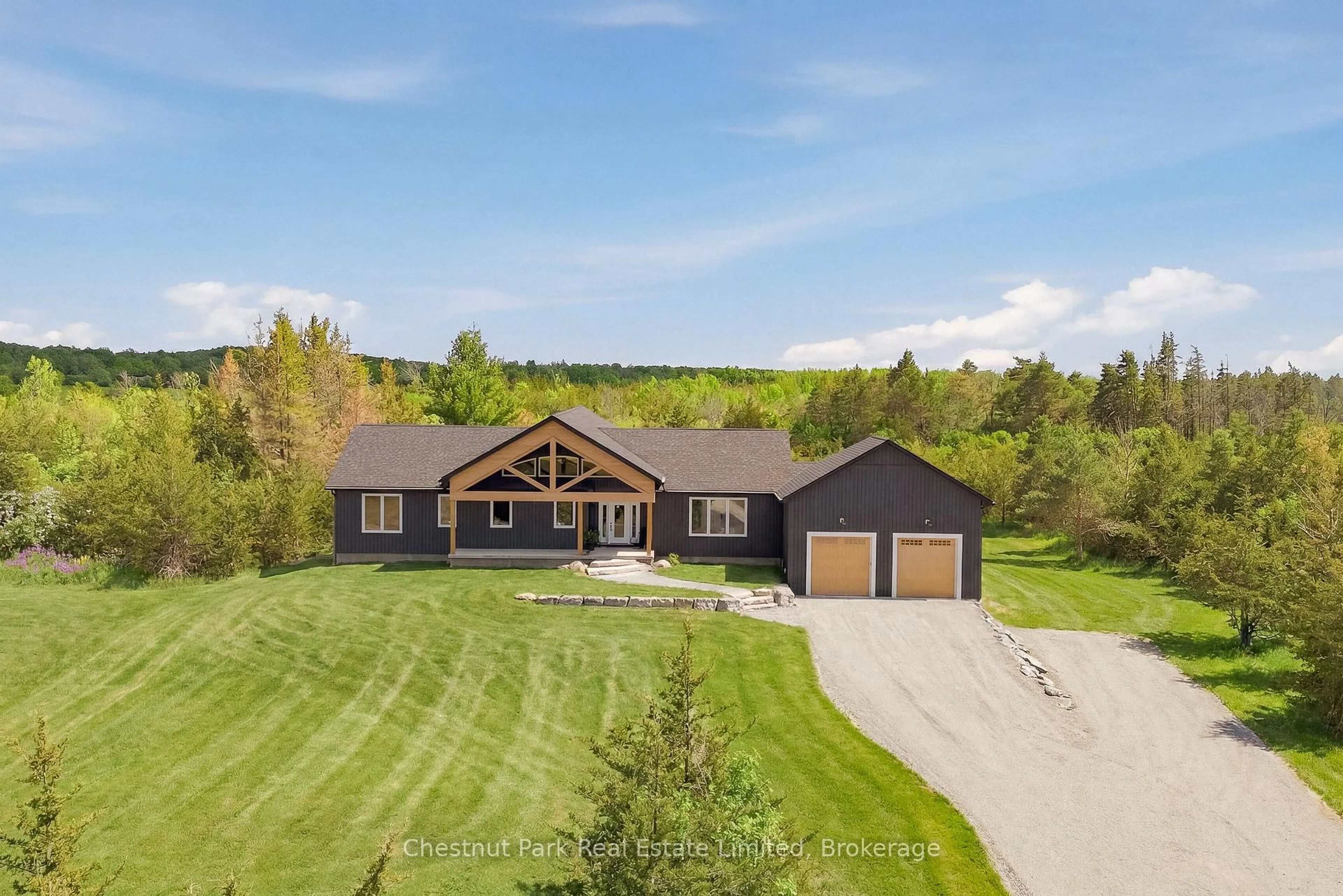 A pic from outside/outdoor area/front of a property/back of a property/a pic from drone, mountain view for 2621 Victoria Rd, Prince Edward County Ontario K0K 2L0