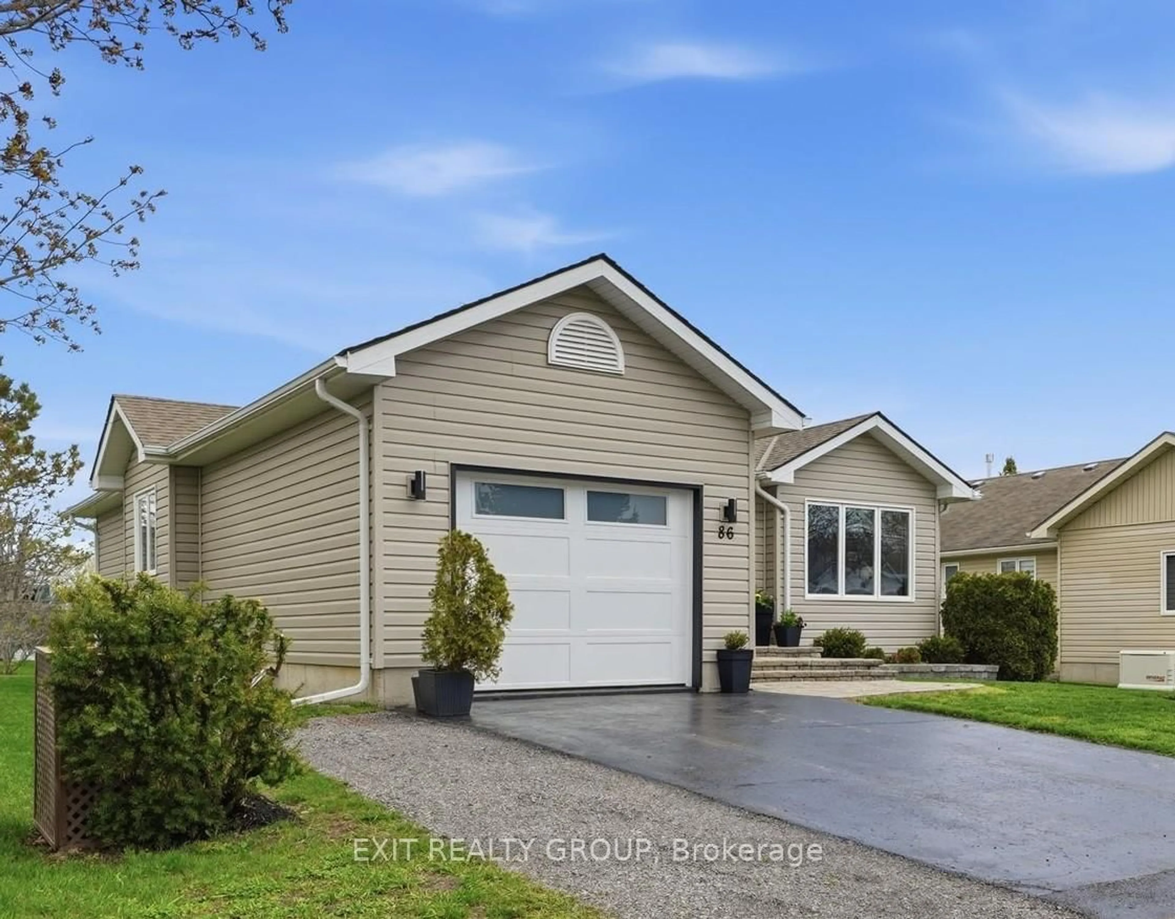 Home with vinyl exterior material, street for 86 Sandbanks Crt, Prince Edward County Ontario K0K 3L0