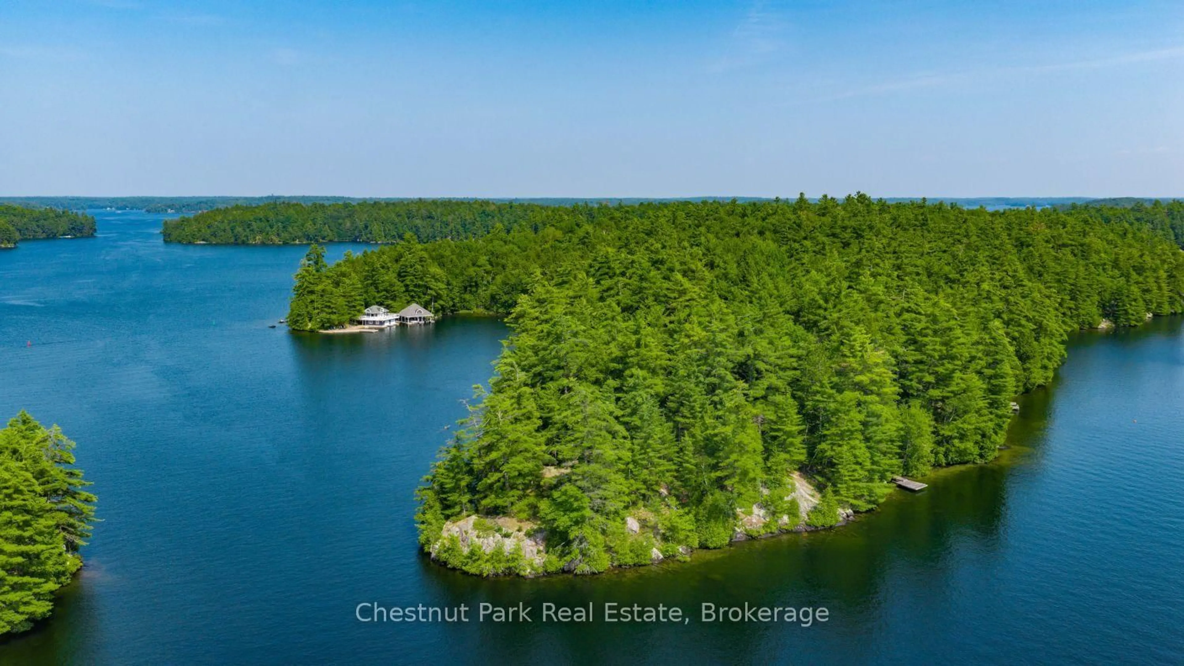 A pic from outside/outdoor area/front of a property/back of a property/a pic from drone, water/lake/river/ocean view for 1 Playfair Island #3, Seguin Ontario P0C 1H0