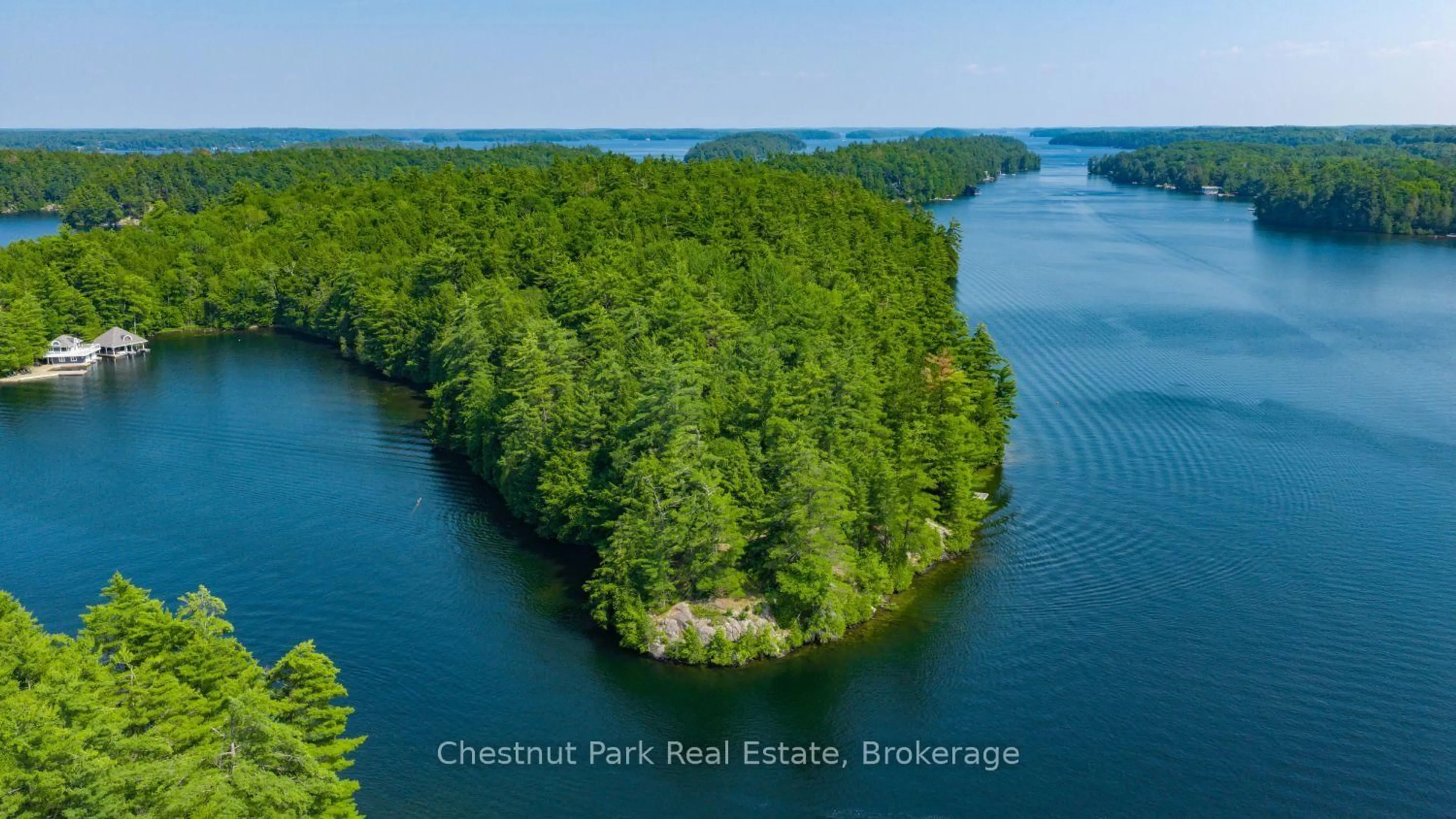 A pic from outside/outdoor area/front of a property/back of a property/a pic from drone, water/lake/river/ocean view for 1 Playfair Island #3, Seguin Ontario P0C 1H0