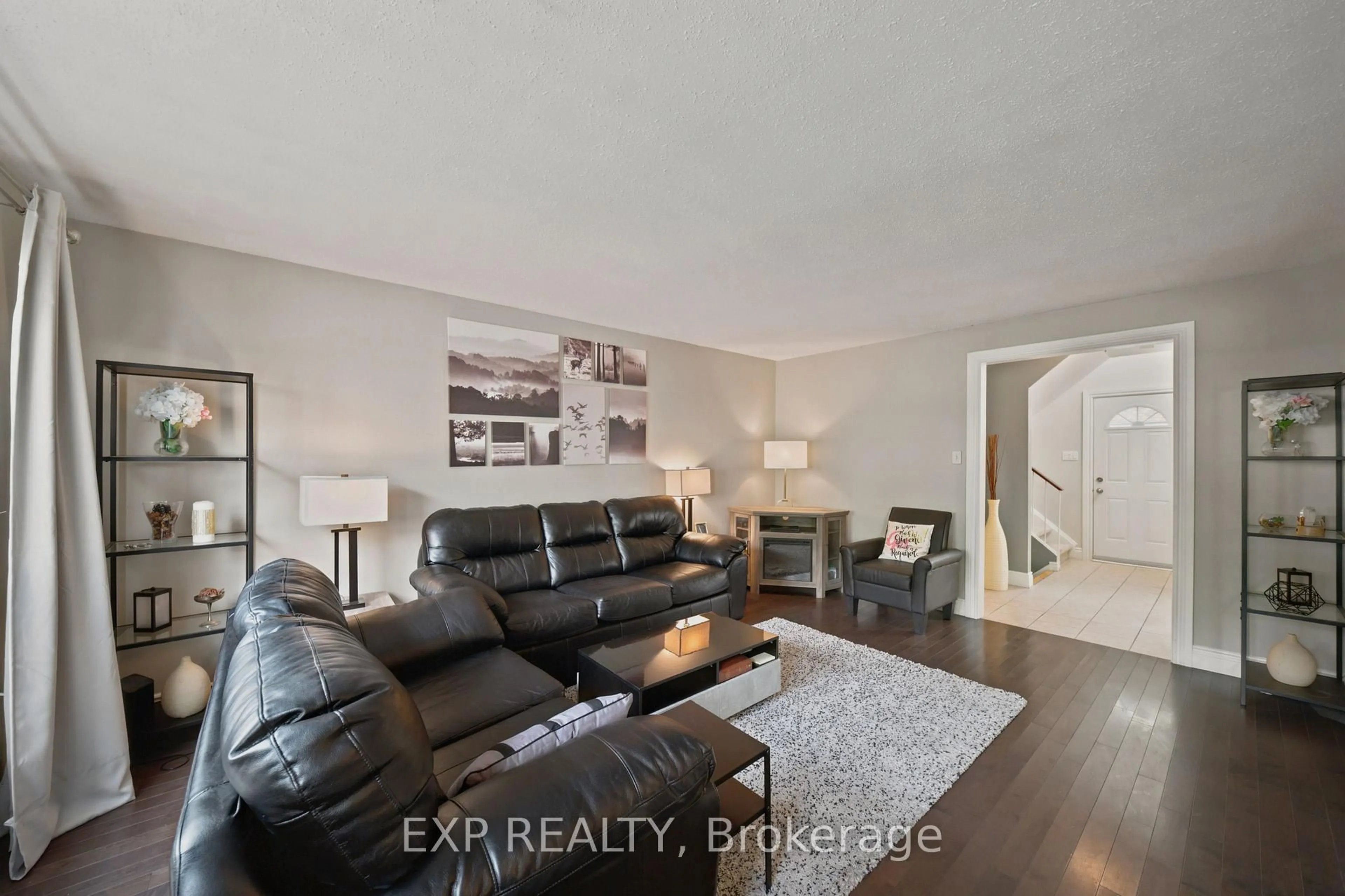 Living room with furniture, unknown for 148 Rutherford Crt #16, Ottawa Ontario K2K 1N6