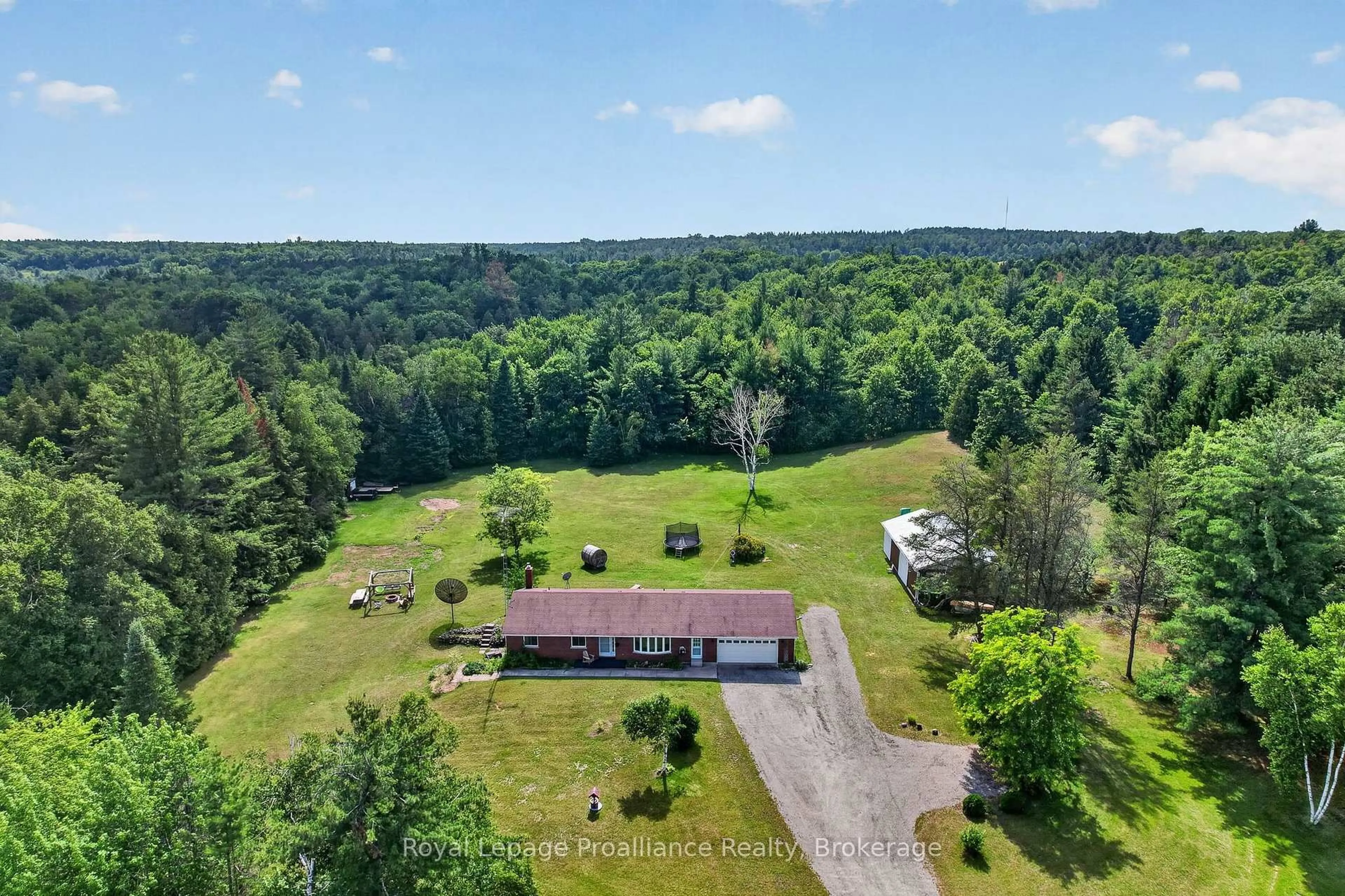 A pic from outside/outdoor area/front of a property/back of a property/a pic from drone, forest/trees view for 150 Woodland Rd, Alnwick/Haldimand Ontario K0K 2X0