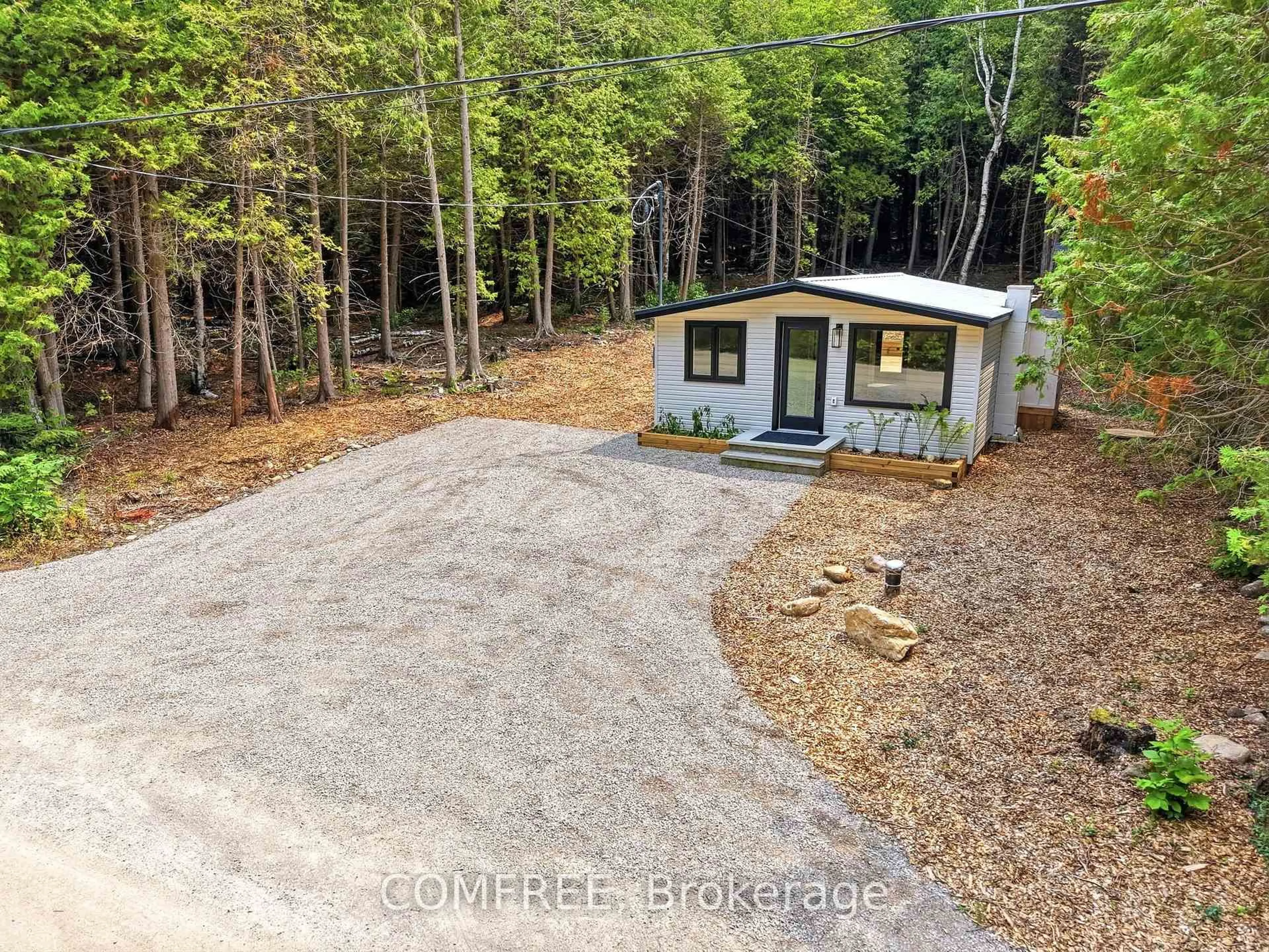 A pic from outside/outdoor area/front of a property/back of a property/a pic from drone, forest/trees view for 86 South Shore Rd, Northern Bruce Peninsula Ontario N0H 1W0