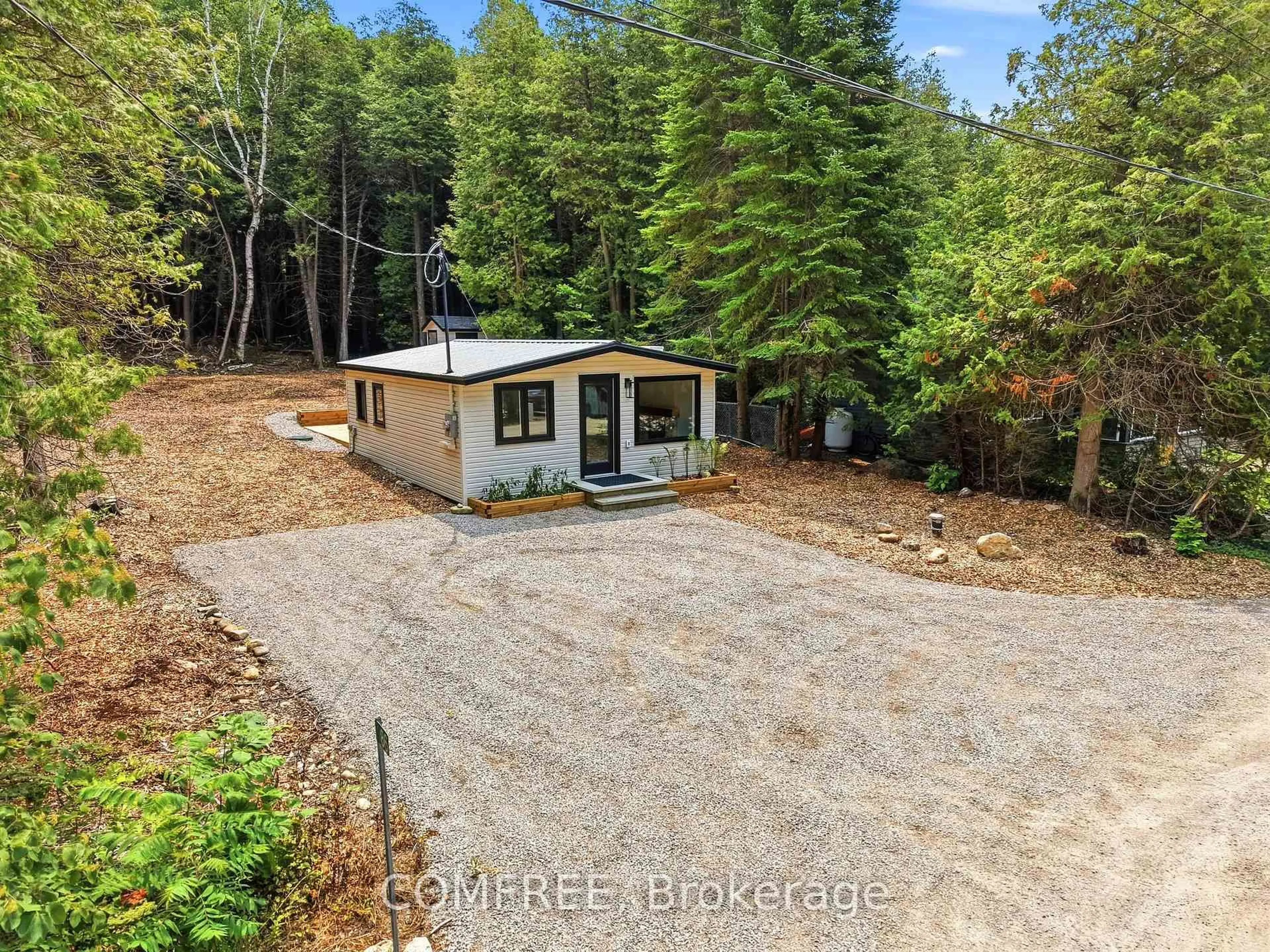 A pic from outside/outdoor area/front of a property/back of a property/a pic from drone, forest/trees view for 86 South Shore Rd, Northern Bruce Peninsula Ontario N0H 1W0