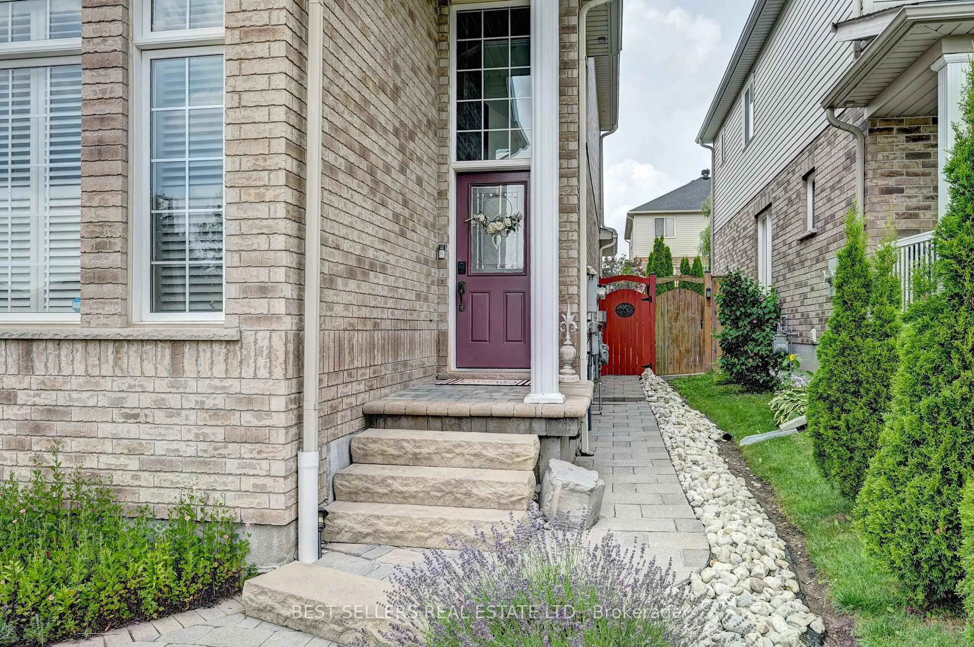 Home with brick exterior material, street for 12 Popham Dr, Guelph Ontario N1E 0B7