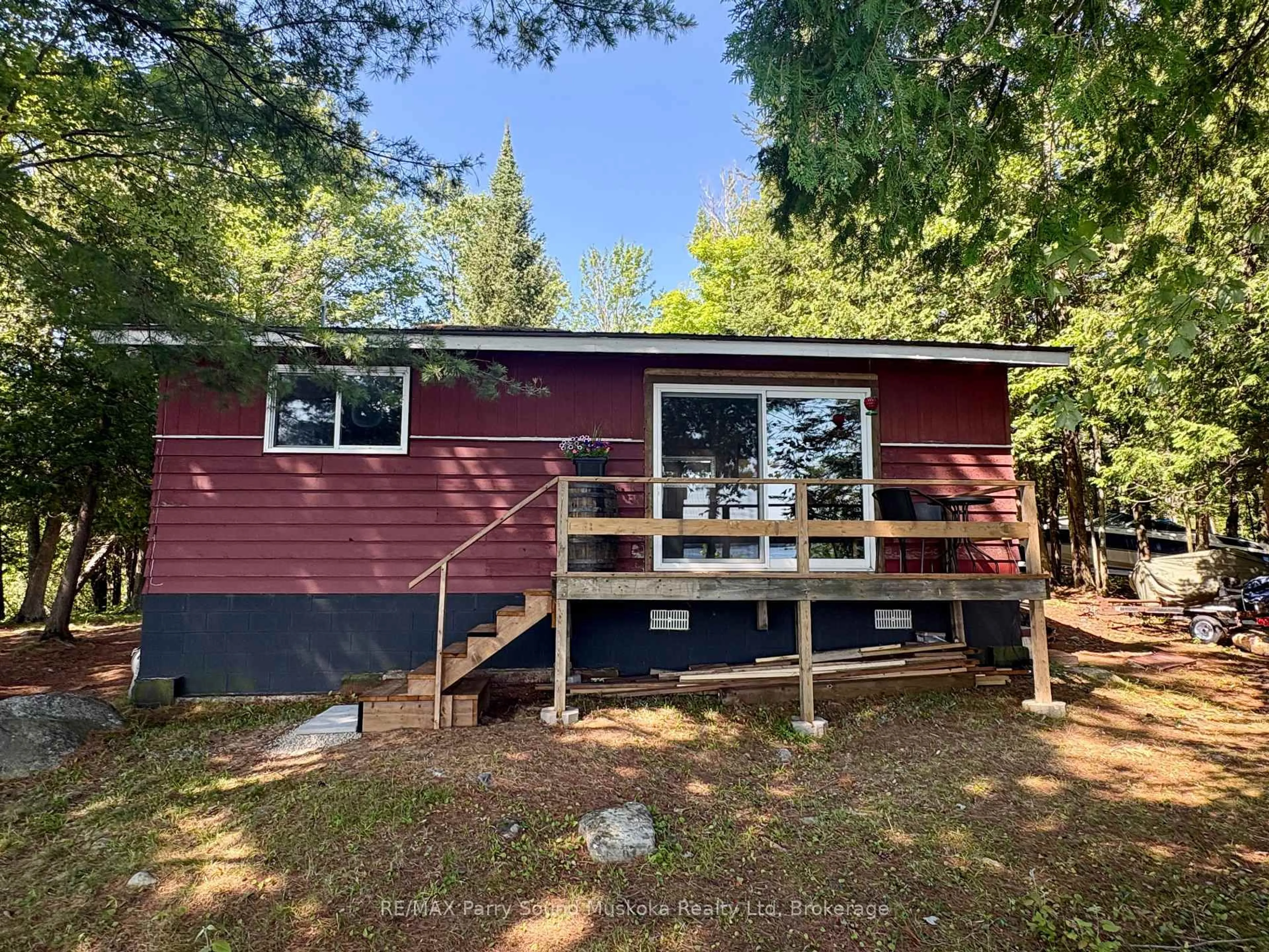 A pic from outside/outdoor area/front of a property/back of a property/a pic from drone, water/lake/river/ocean view for 3 Robinson Rd, Magnetawan Ontario P0A 1P0