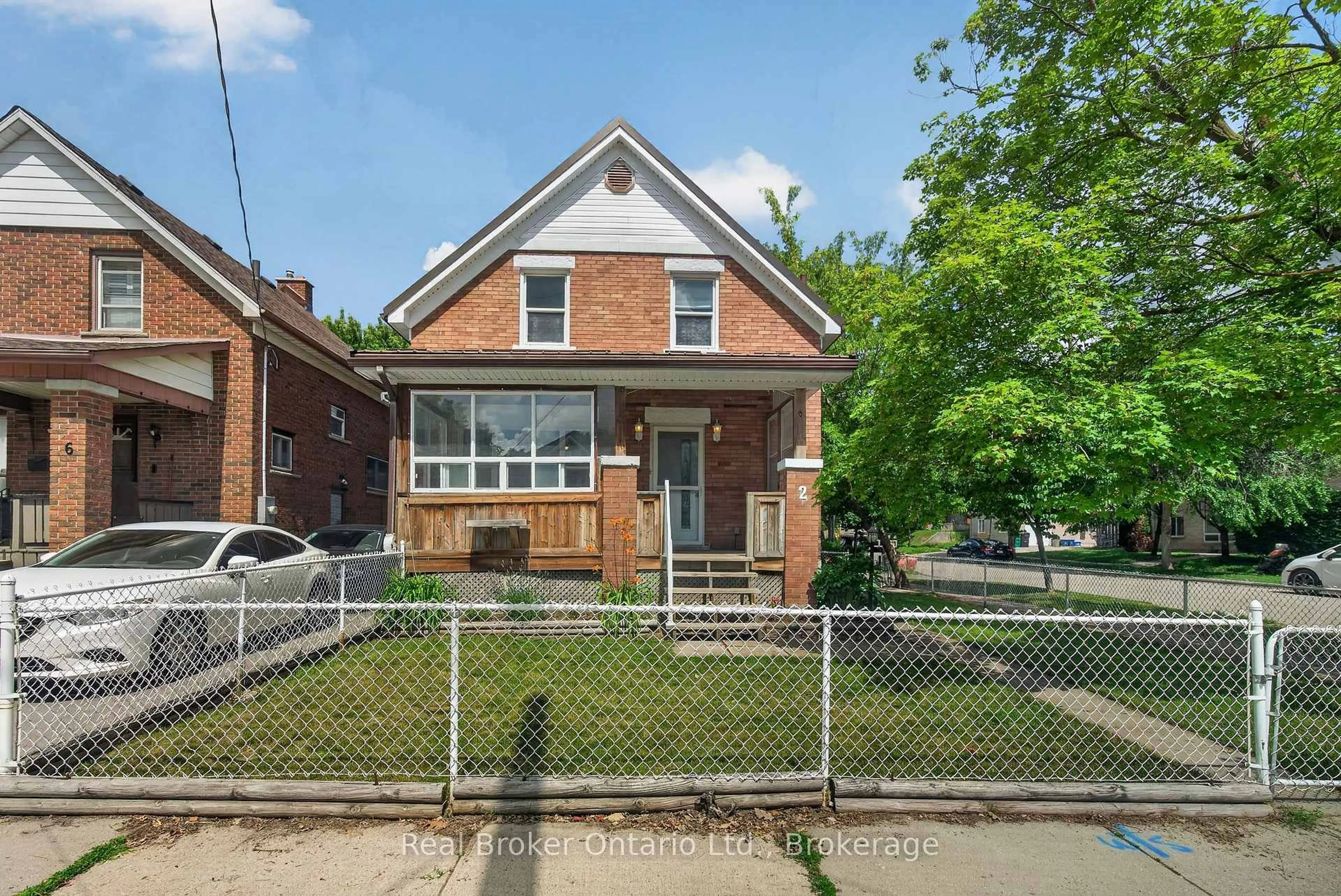 Home with brick exterior material, street for 2 Herlan Ave, Kitchener Ontario N2G 4K3
