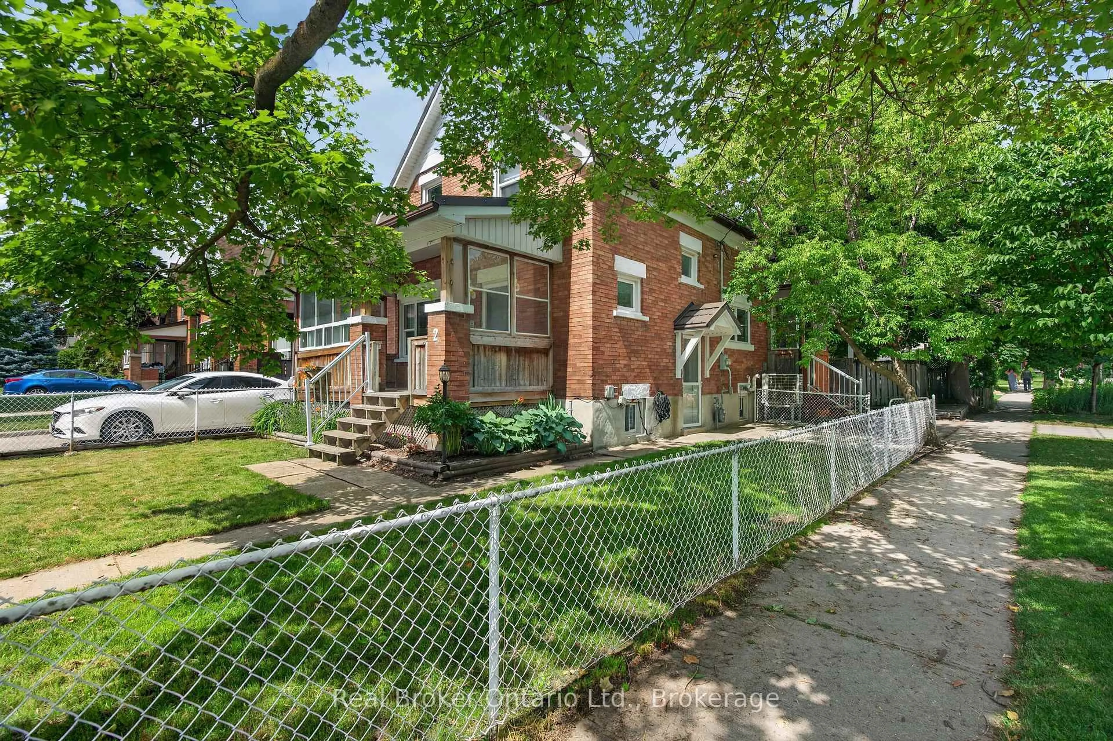 Home with brick exterior material, street for 2 Herlan Ave, Kitchener Ontario N2G 4K3