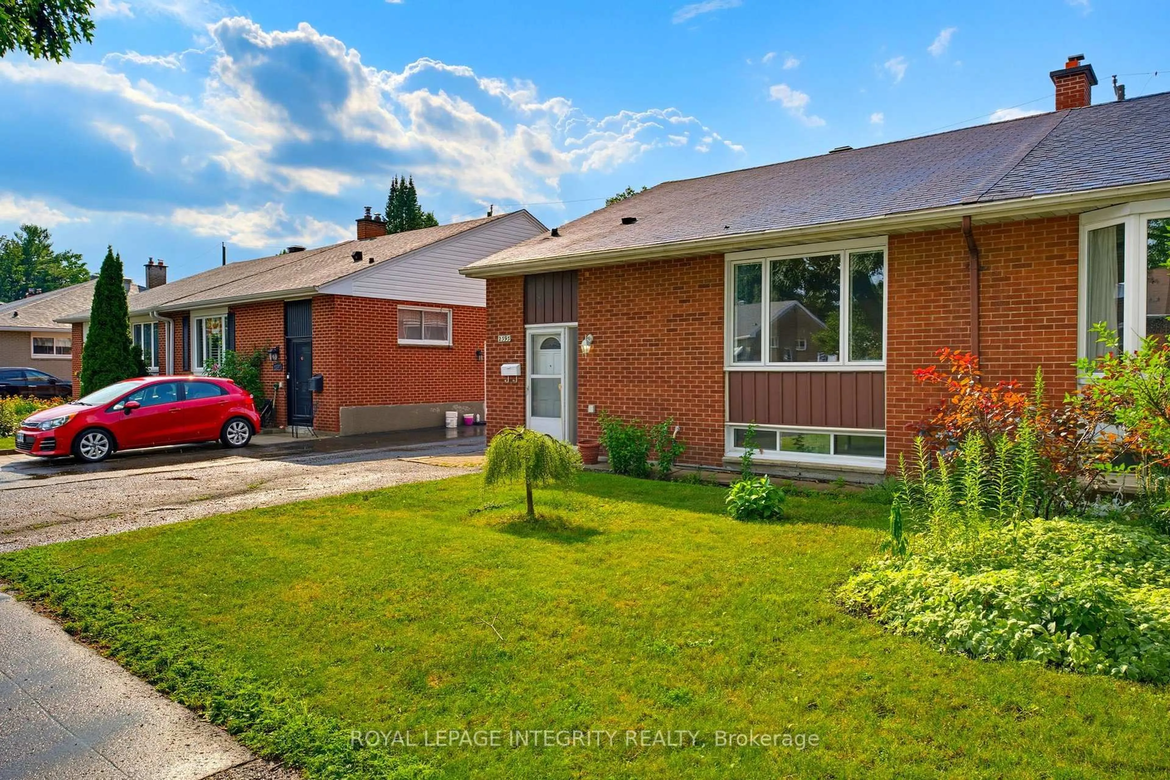 Home with brick exterior material, street for 2393 Iris St, Ottawa Ontario K2C 1C7