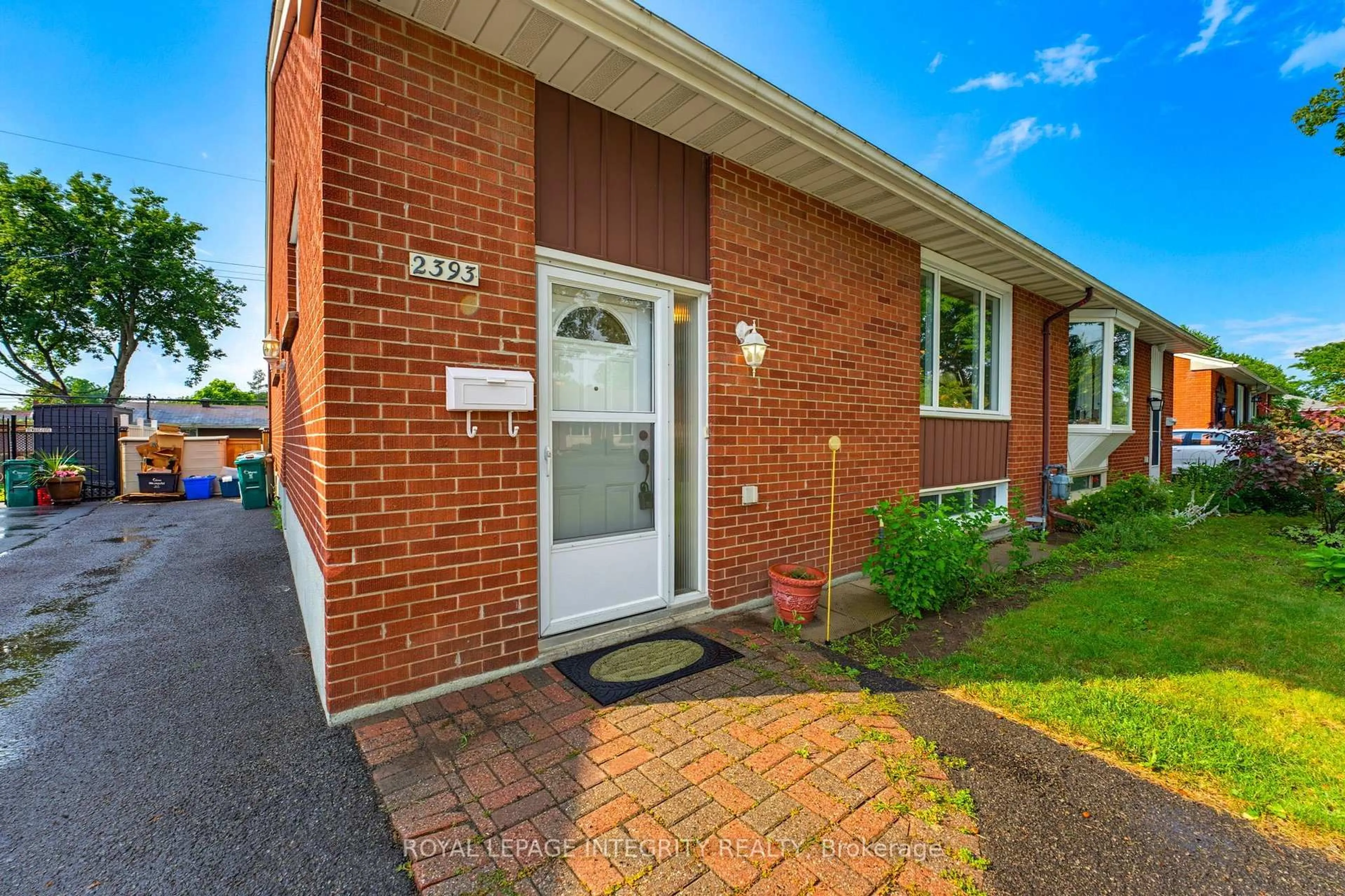 Home with brick exterior material, street for 2393 Iris St, Ottawa Ontario K2C 1C7
