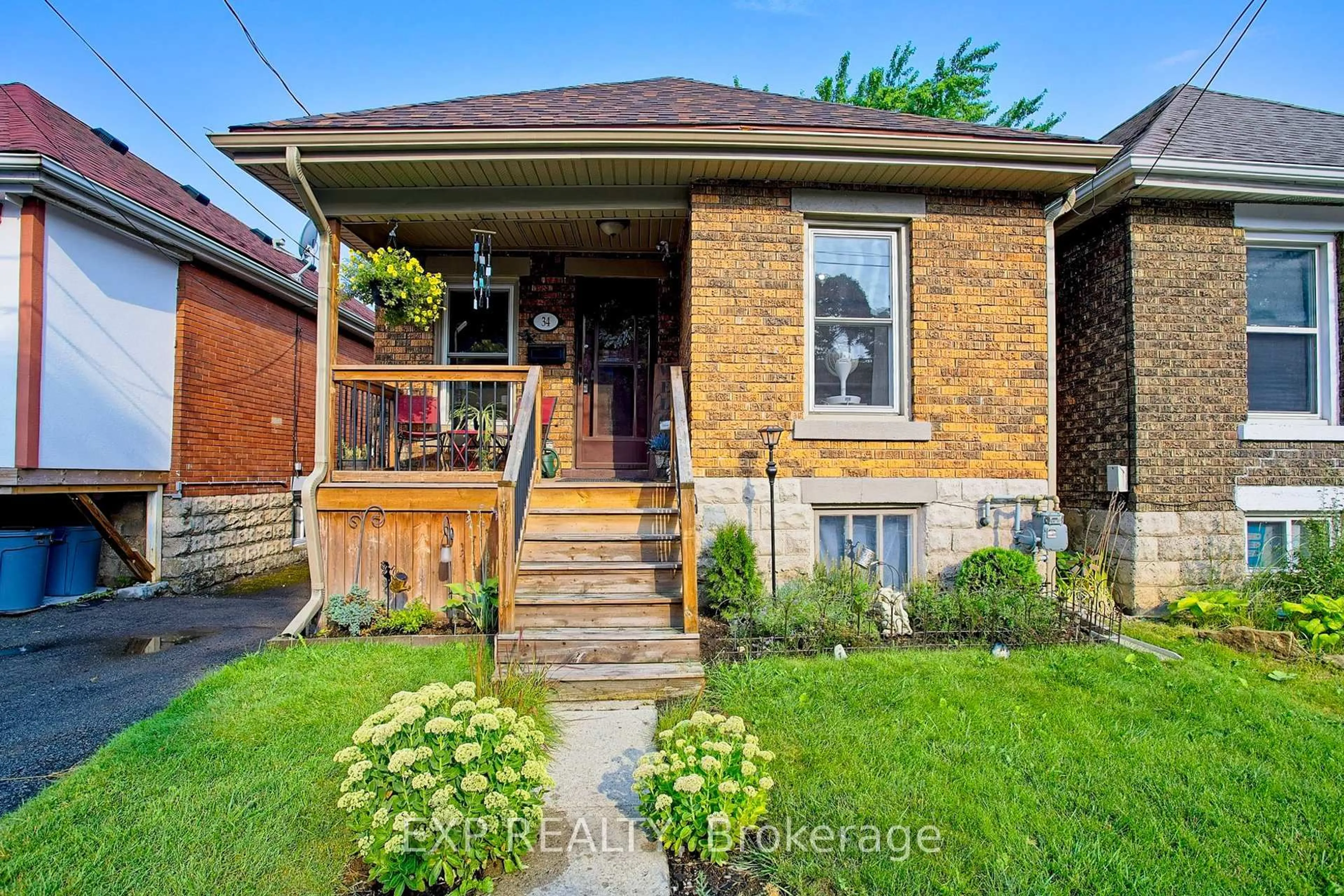 Home with brick exterior material, street for 34 Poplar Ave, Hamilton Ontario L8V 2S6
