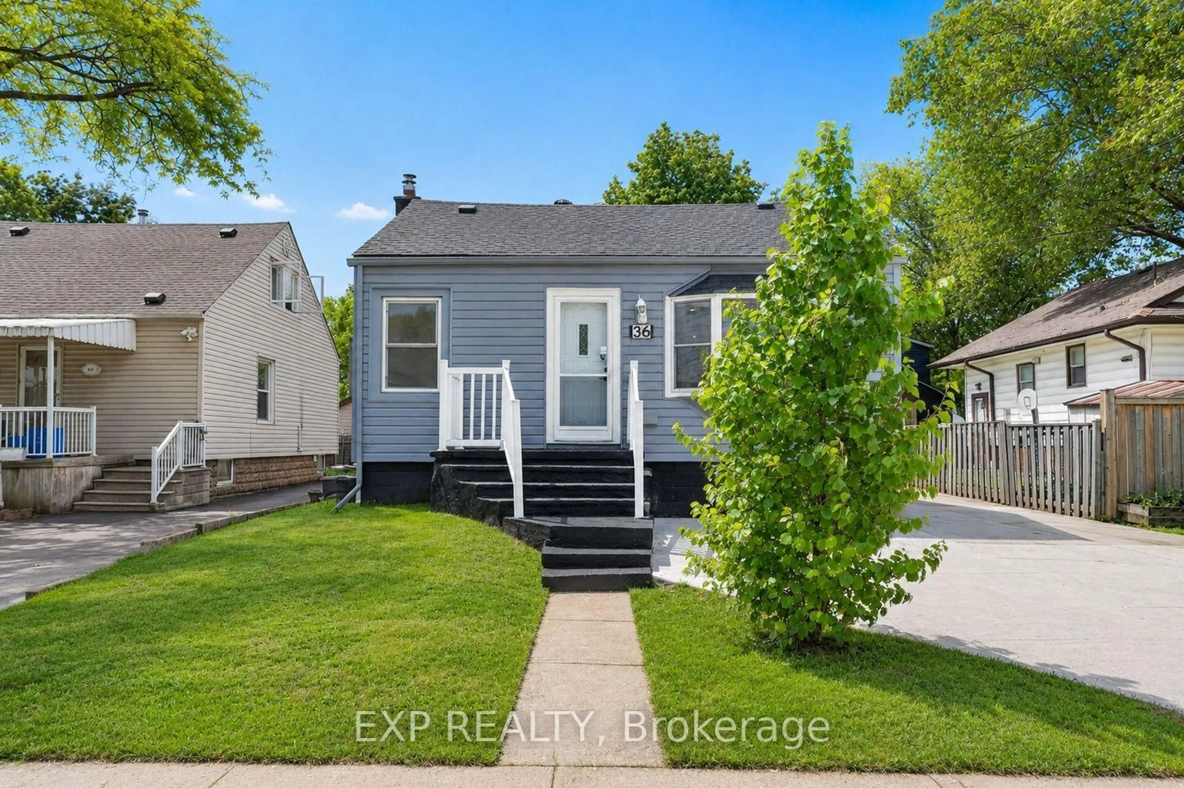 Home with vinyl exterior material, street for 36 Mahony Ave, Hamilton Ontario L8H 3C5