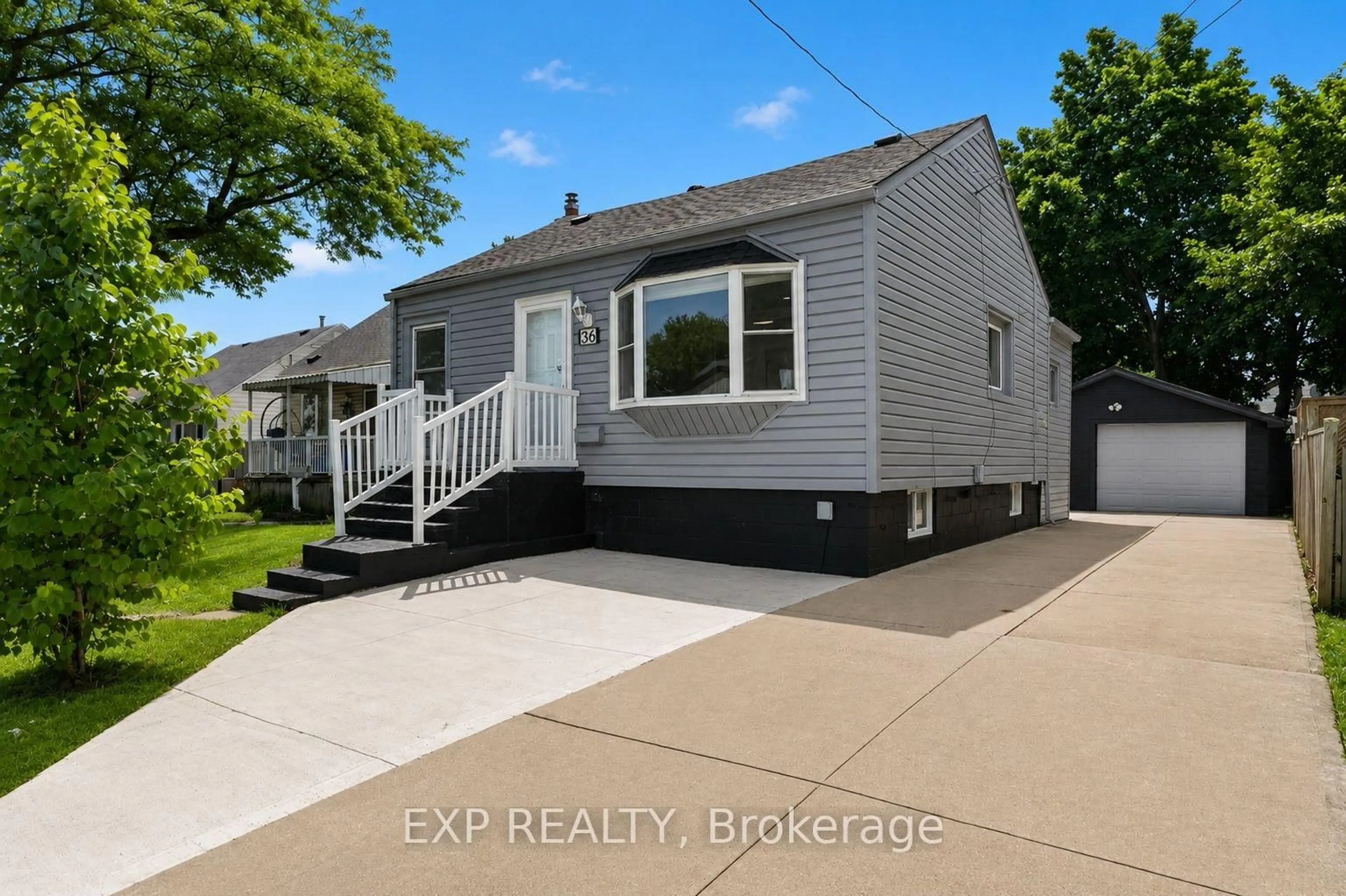 Home with vinyl exterior material, street for 36 Mahony Ave, Hamilton Ontario L8H 3C5