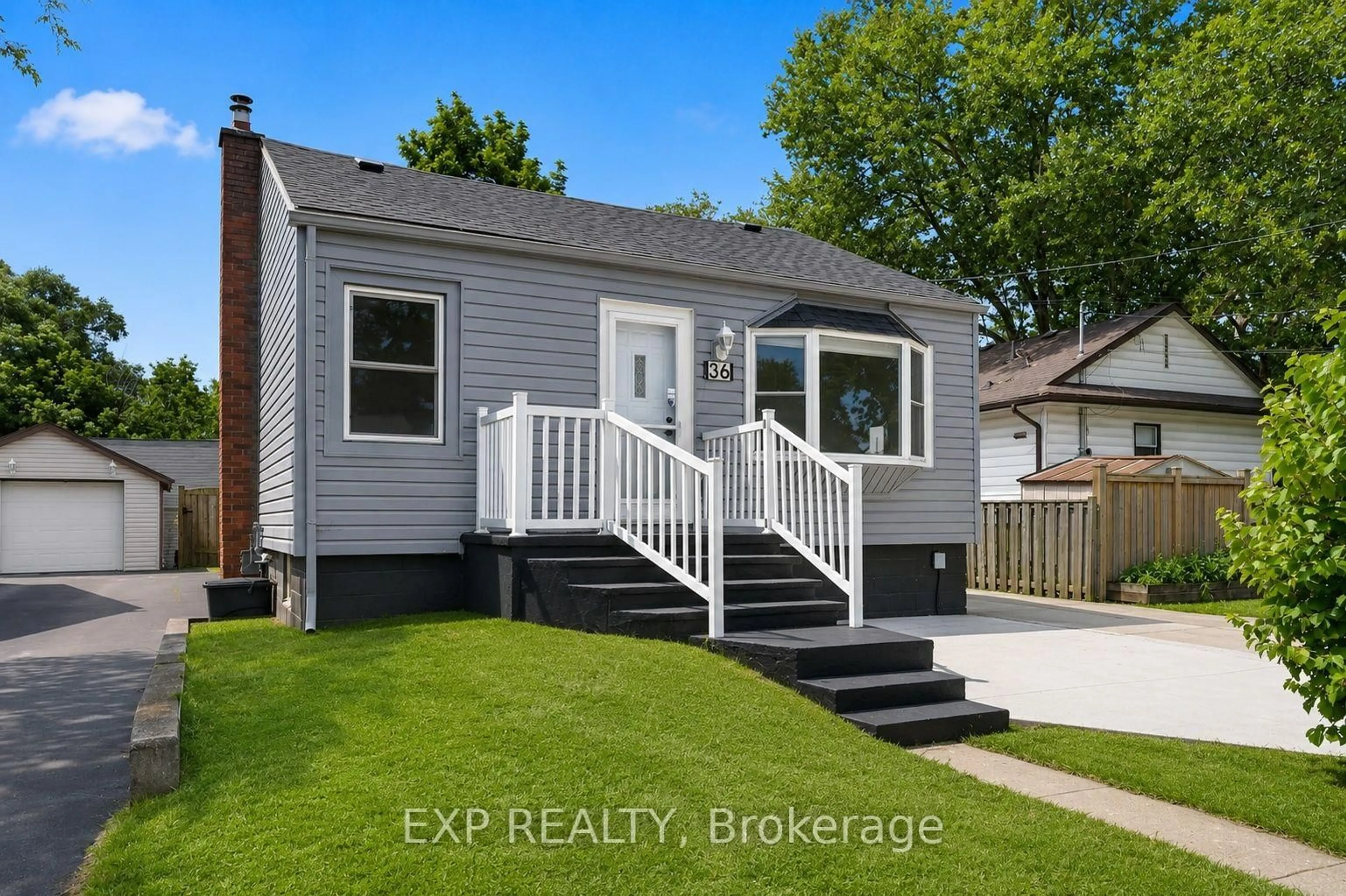 Home with vinyl exterior material, street for 36 Mahony Ave, Hamilton Ontario L8H 3C5