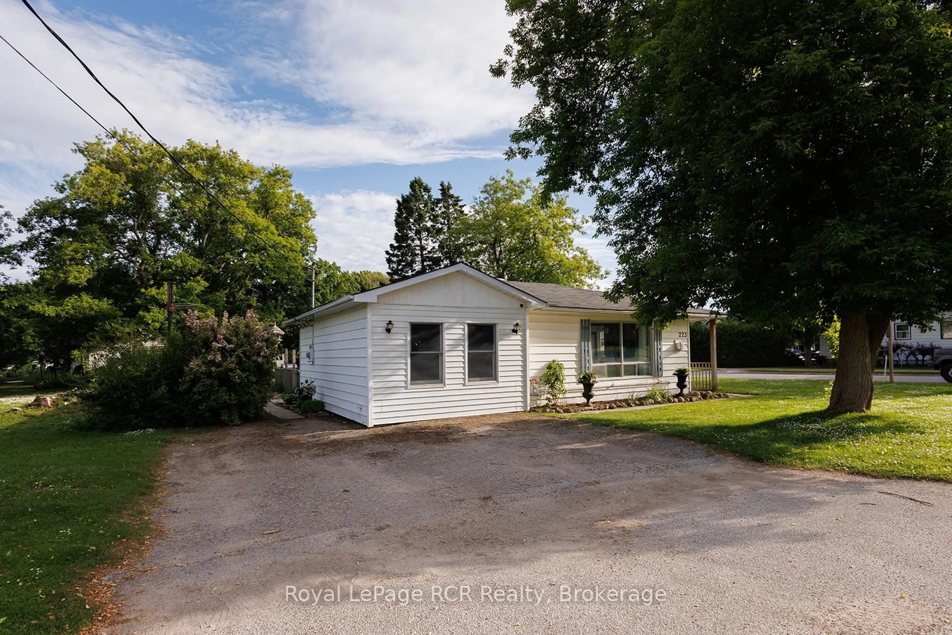 A pic from outside/outdoor area/front of a property/back of a property/a pic from drone, street for 223 Division St, South Bruce Peninsula Ontario N0H 2T0