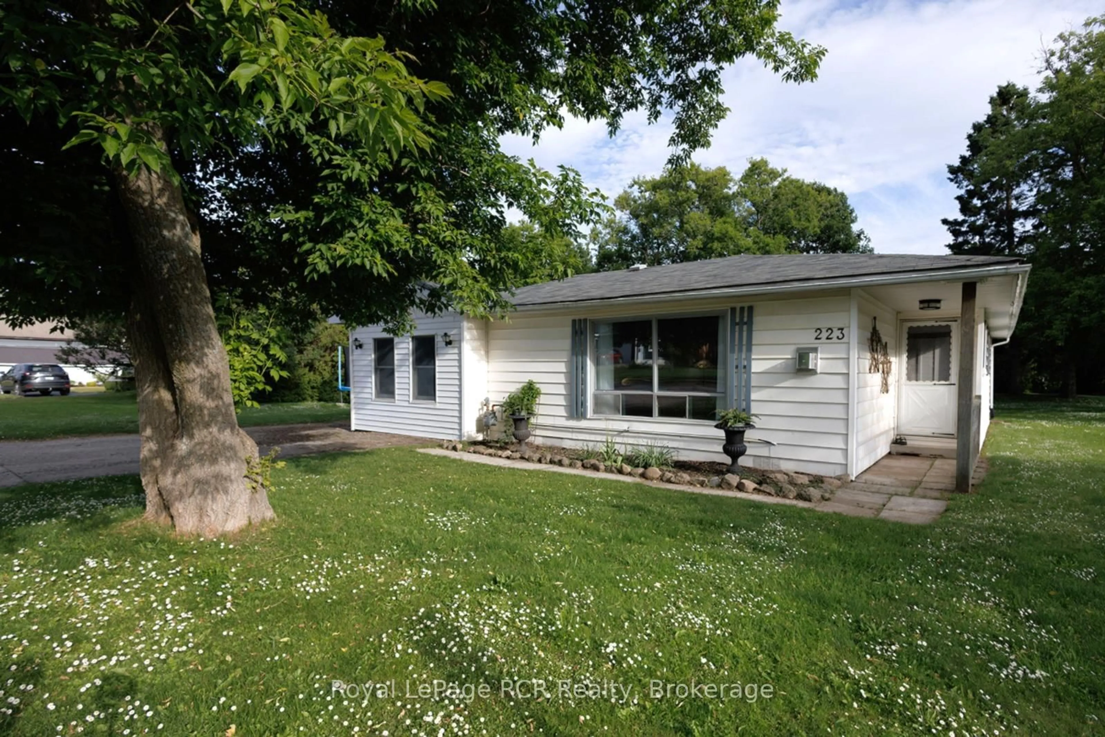 Home with vinyl exterior material, street for 223 Division St, South Bruce Peninsula Ontario N0H 2T0