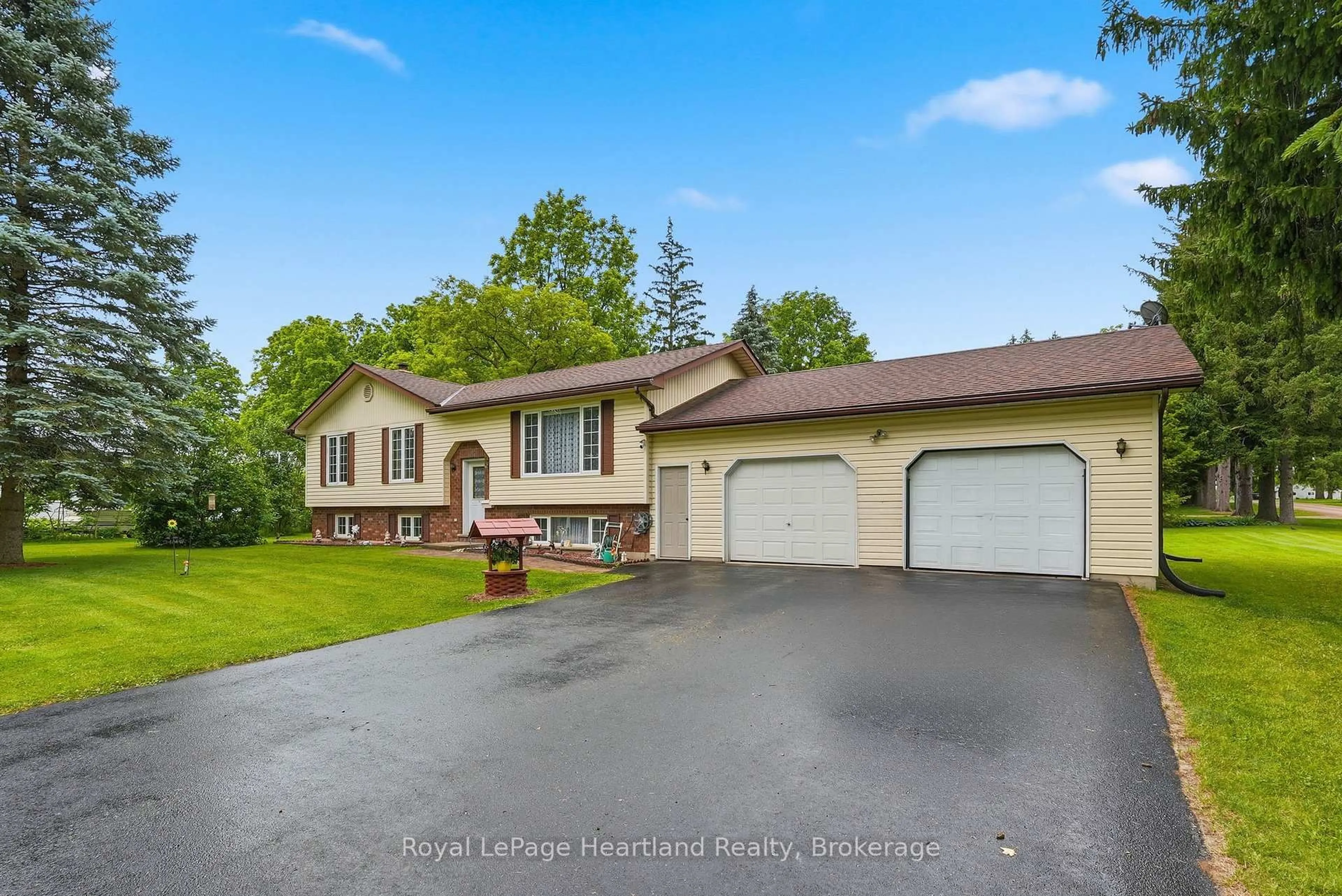 A pic from outside/outdoor area/front of a property/back of a property/a pic from drone, water/lake/river/ocean view for 947 Caroline St, West Grey Ontario N0G 1C0
