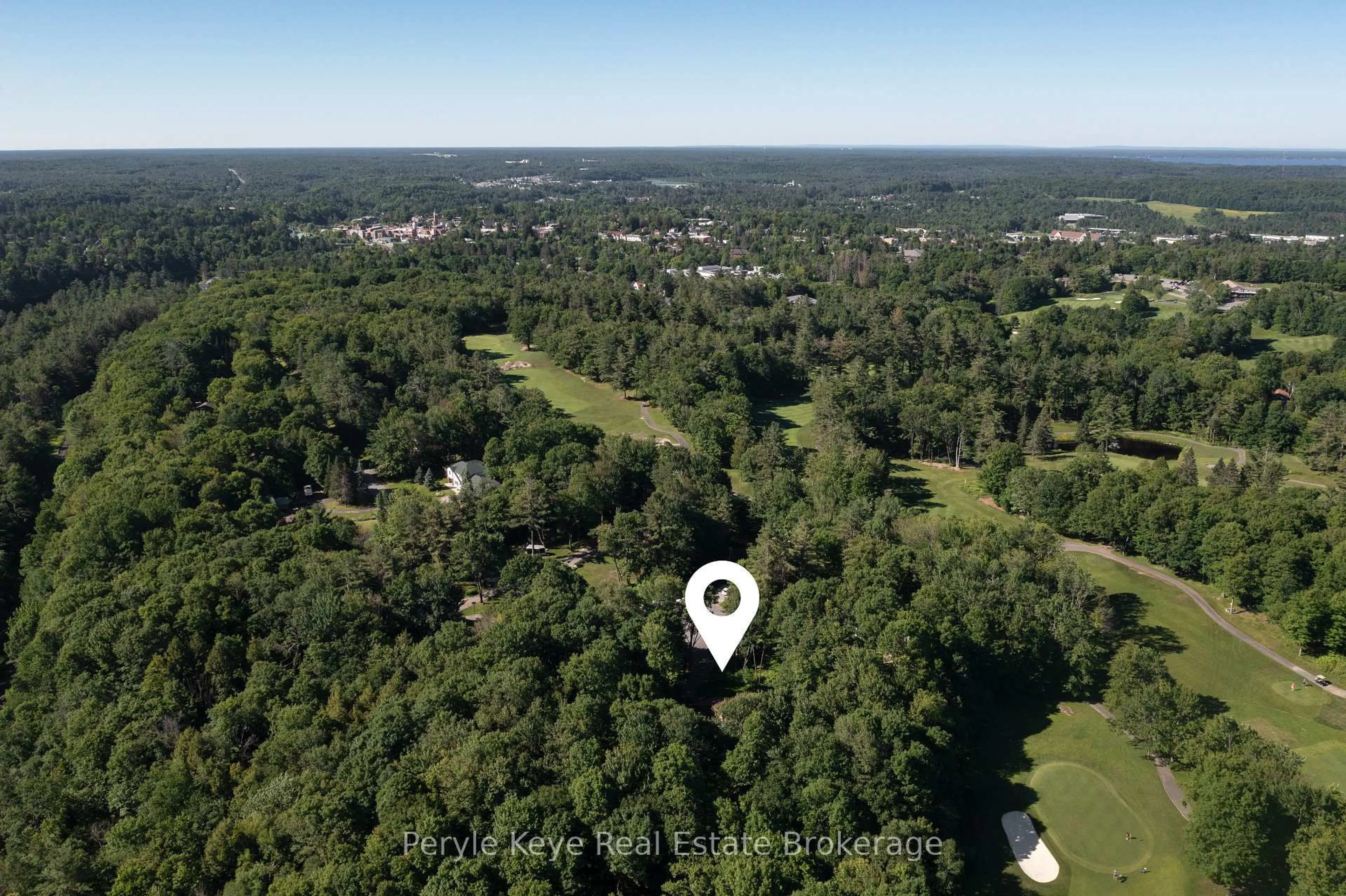 A pic from outside/outdoor area/front of a property/back of a property/a pic from drone, forest/trees view for 41 South Muskoka Dr, Bracebridge Ontario P1L 1M4