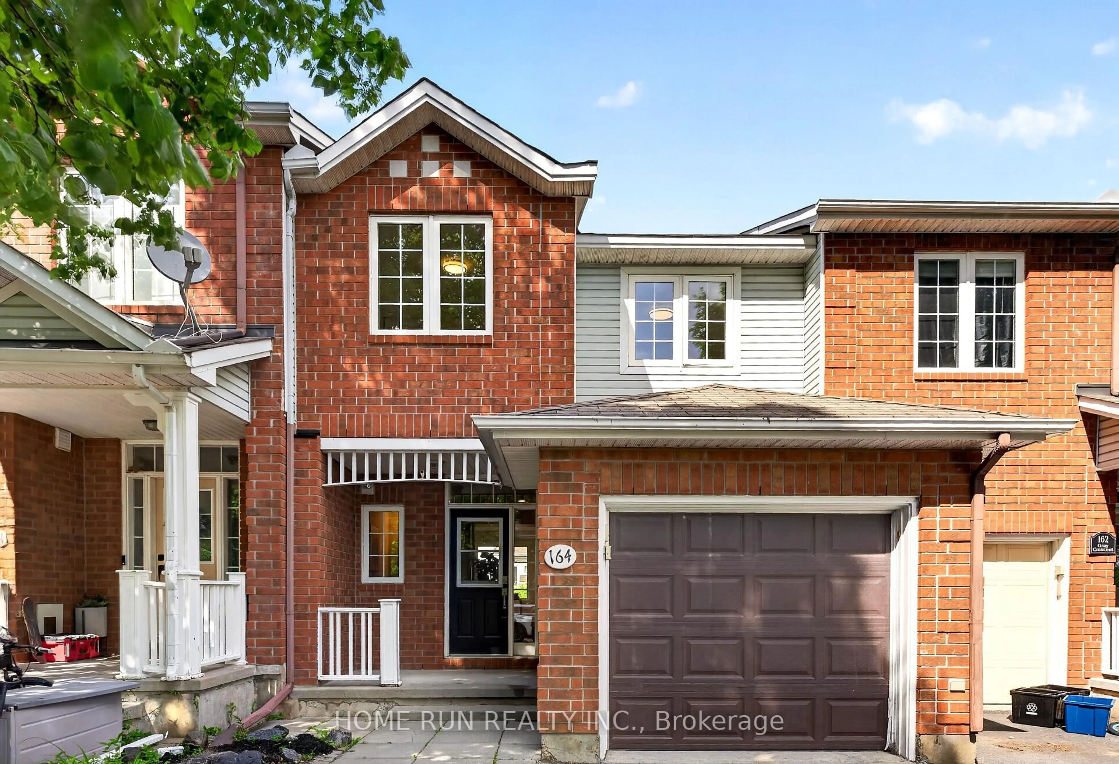 Home with brick exterior material, street for 164 Gray Cres, Ottawa Ontario K2K 3L9