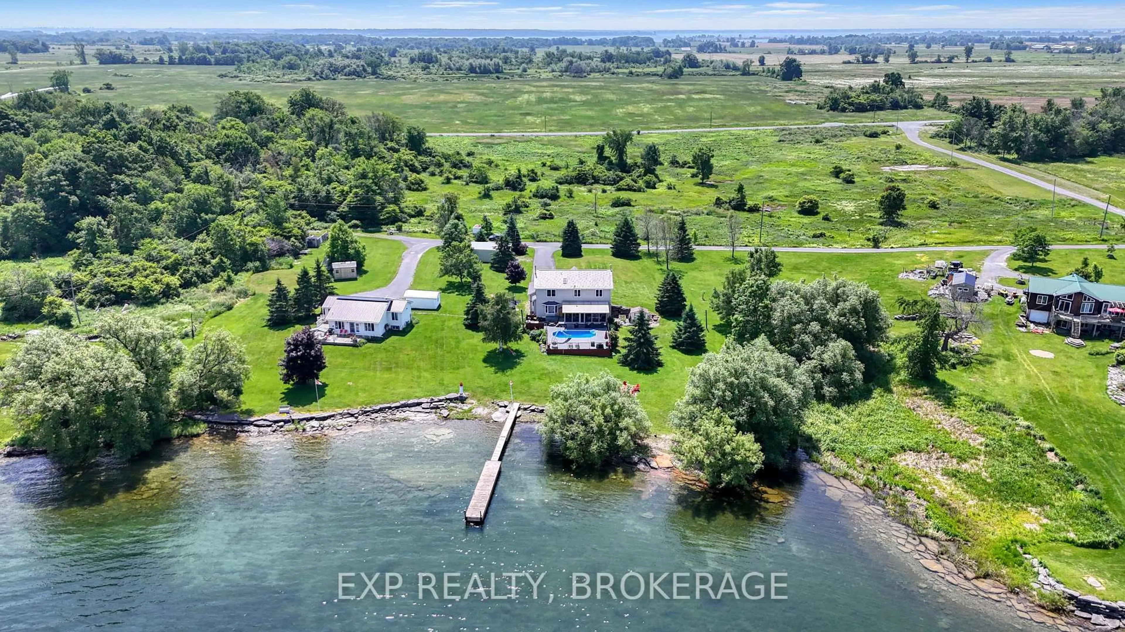 A pic from outside/outdoor area/front of a property/back of a property/a pic from drone, water/lake/river/ocean view for 26 BOXEN HARBOUR Lane, Wolfe Island Ontario K0H 2Y0
