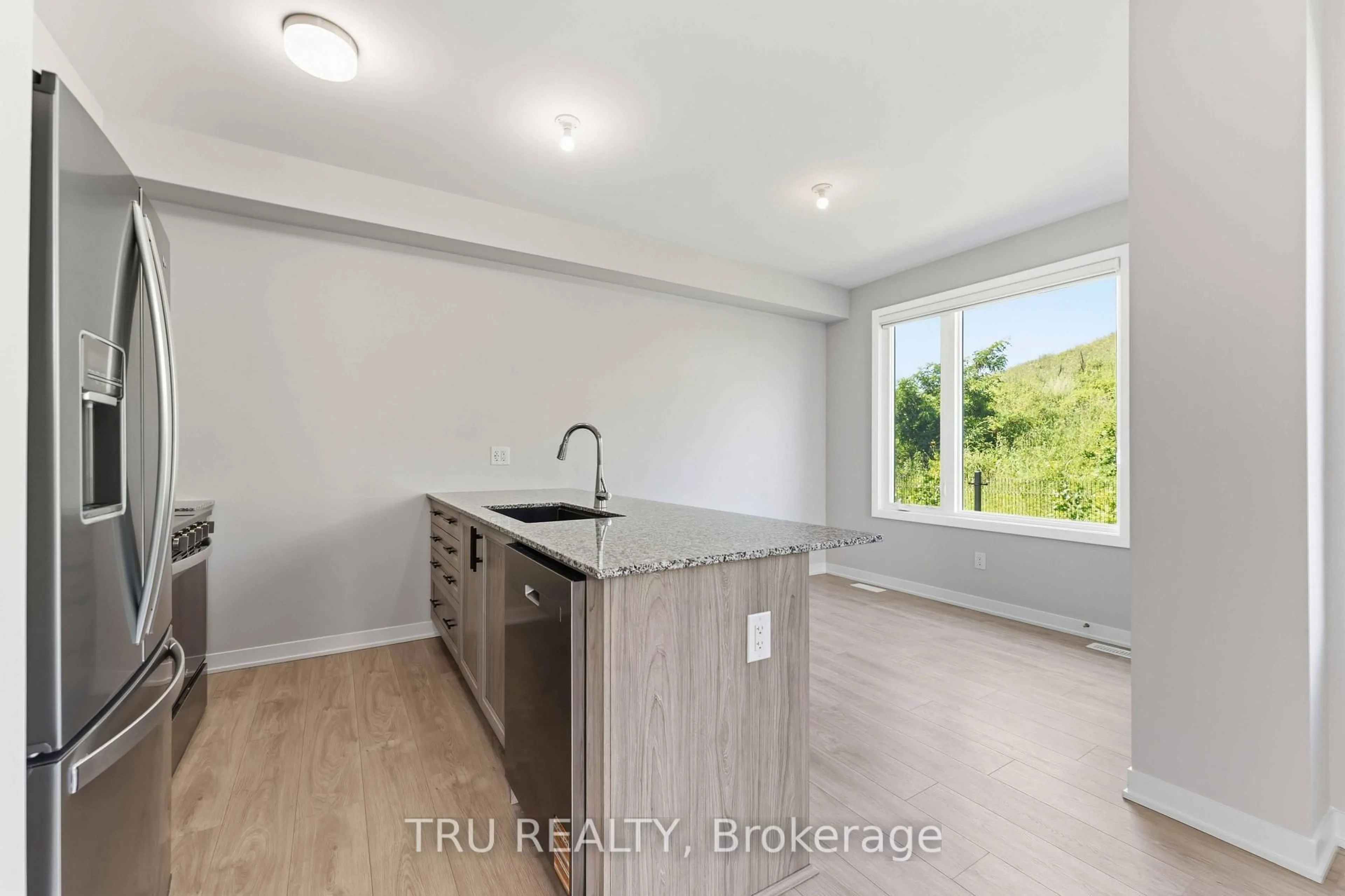 Open concept kitchen, unknown for 706 Expansion Rd, Barrhaven Ontario K2J 7G4