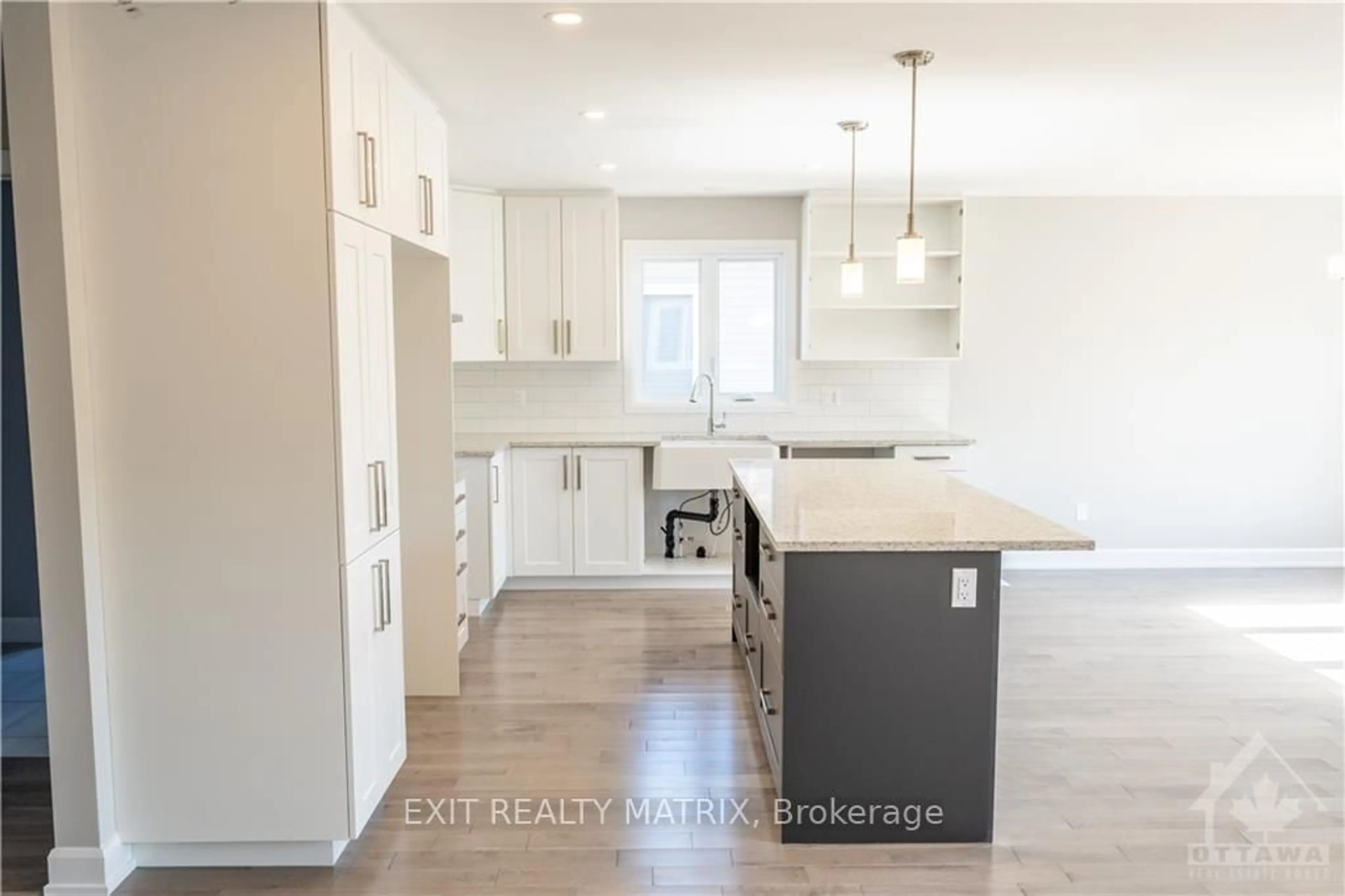 Open concept kitchen, wood/laminate floor for 17 Glenco Rd, South Stormont Ontario K0C 2A0