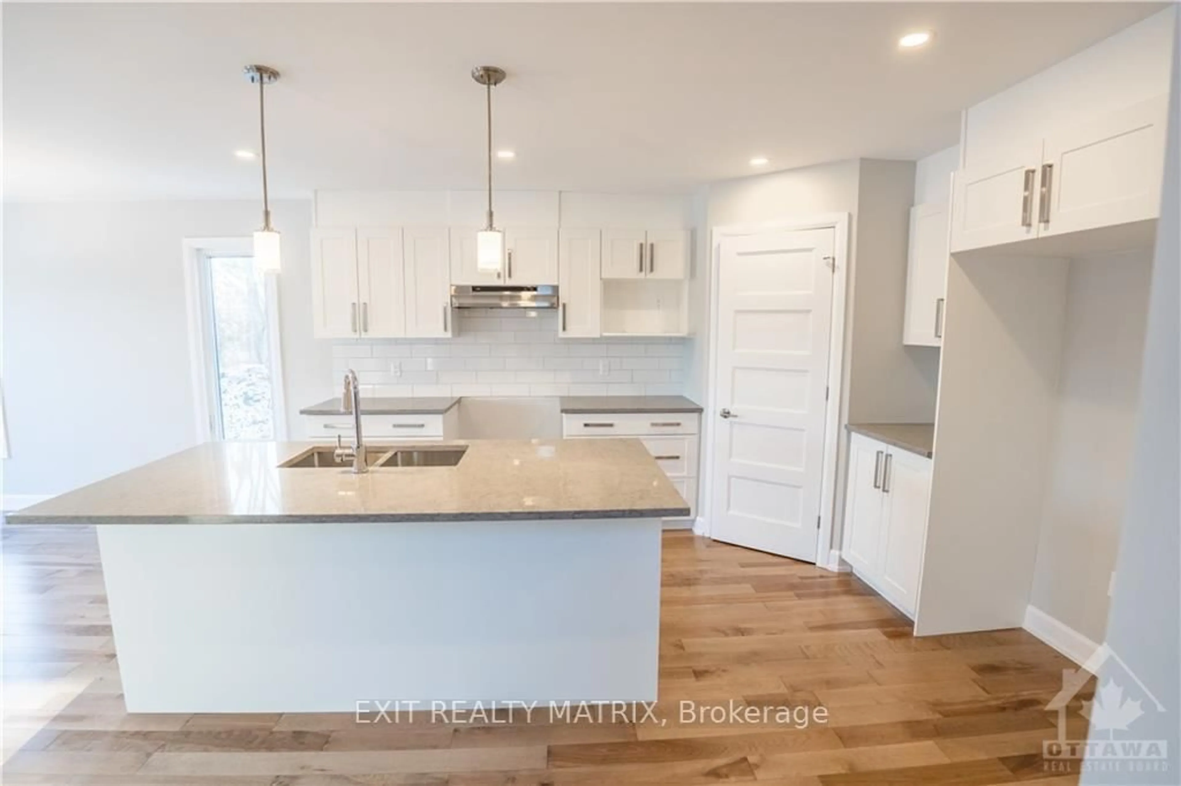 Open concept kitchen, wood/laminate floor for 6 Glenco Rd, South Stormont Ontario K0C 2A0