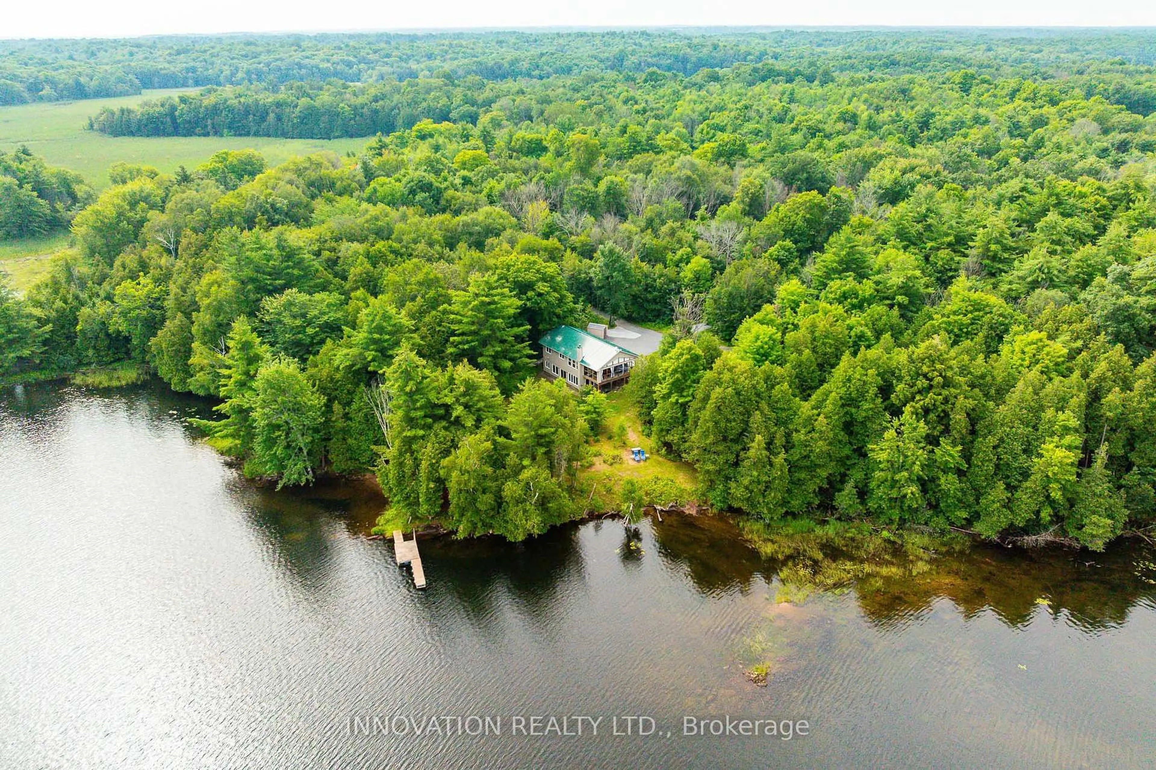 A pic from outside/outdoor area/front of a property/back of a property/a pic from drone, water/lake/river/ocean view for 688 Dewitt Lane, Godfrey Ontario K0H 1T0