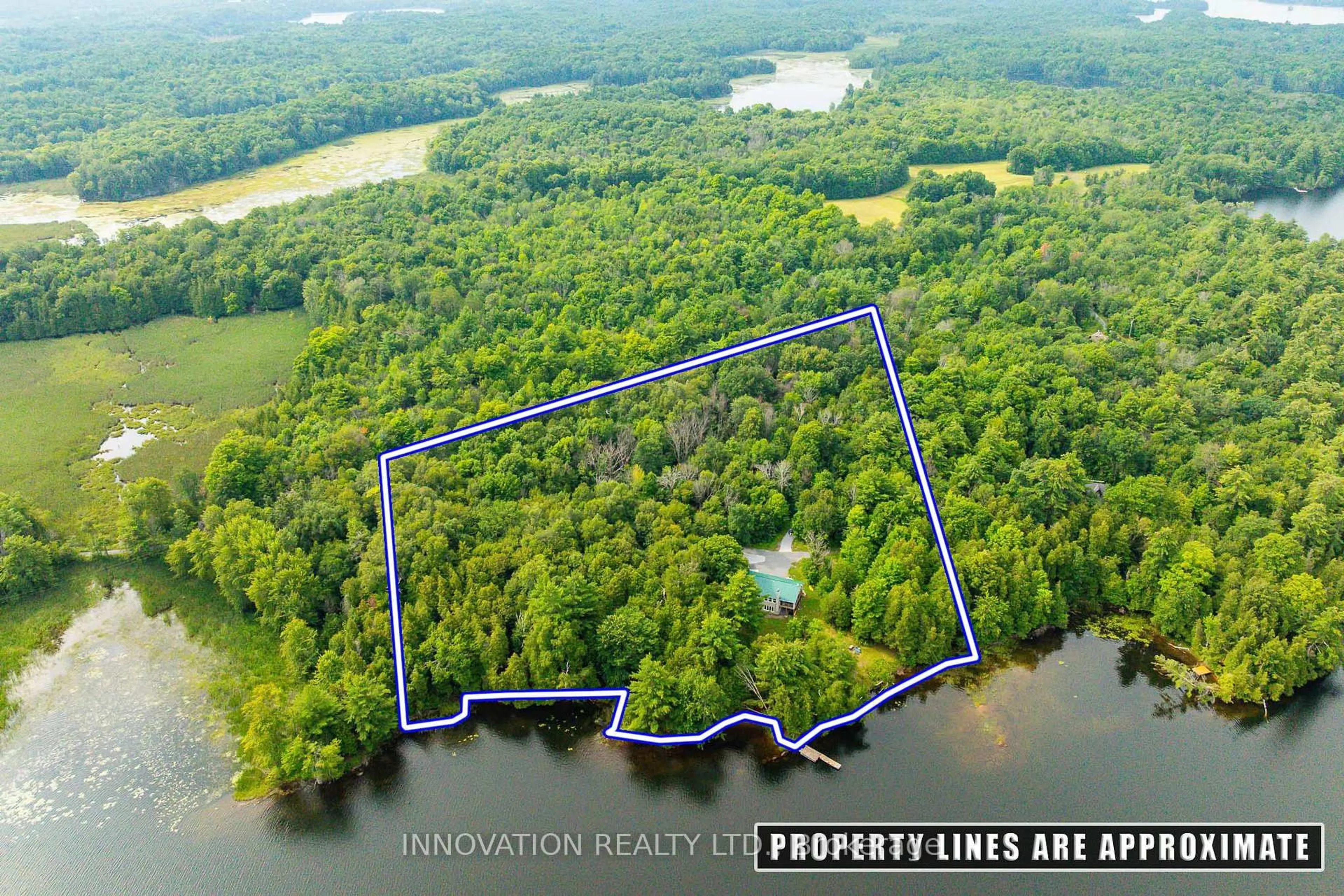 A pic from outside/outdoor area/front of a property/back of a property/a pic from drone, water/lake/river/ocean view for 688 Dewitt Lane, Godfrey Ontario K0H 1T0