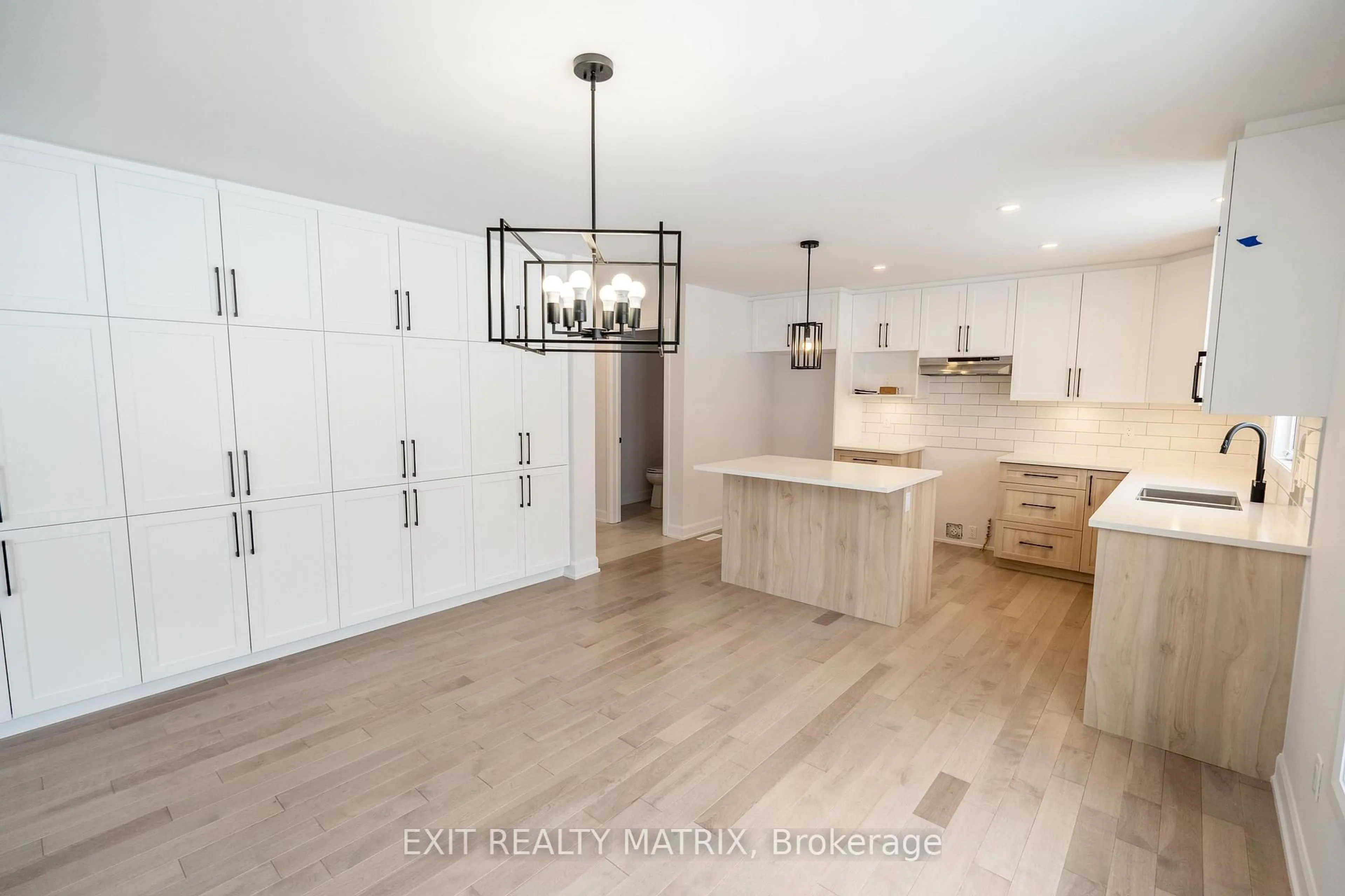 Open concept kitchen, wood/laminate floor for 10 Glenco Rd, South Stormont Ontario K0C 2A0