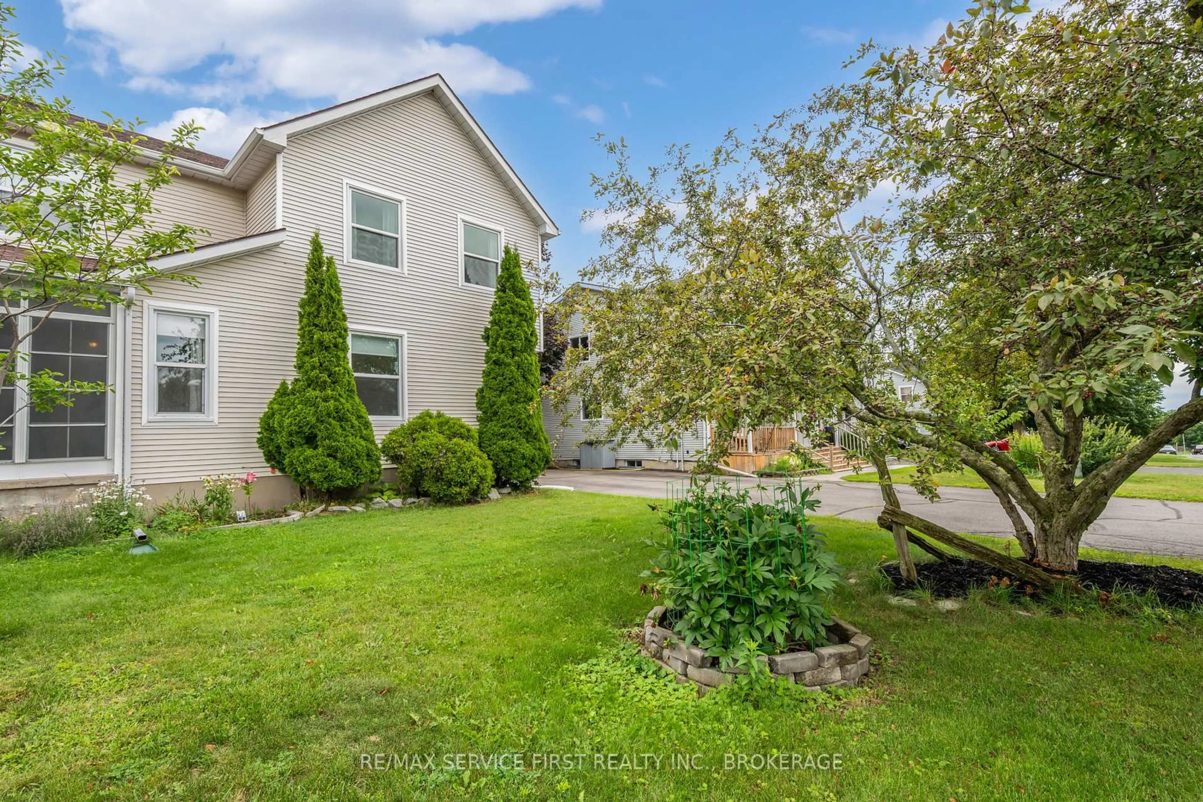 A pic from outside/outdoor area/front of a property/back of a property/a pic from drone, water/lake/river/ocean view for 53 MCKEOWN Cres, Loyalist Ontario K7N 1Y4
