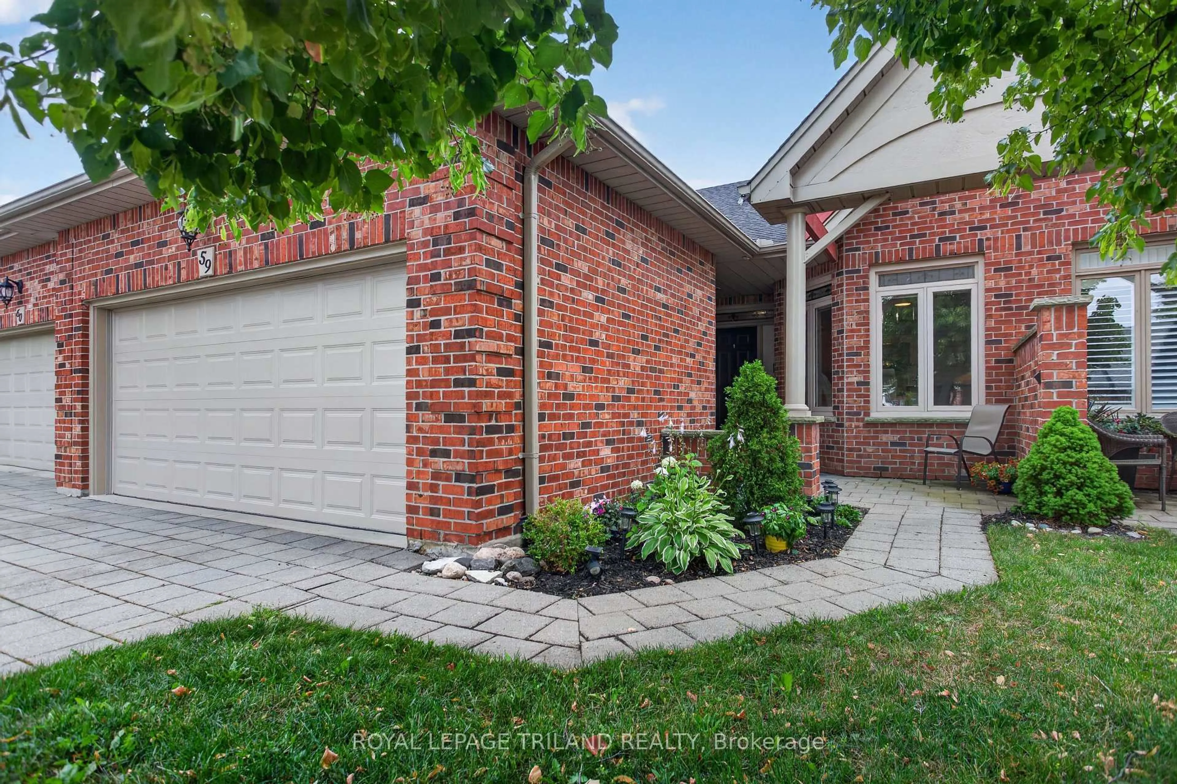 Home with brick exterior material, street for 50 Northumberland Rd #59, London North Ontario N6H 5J2