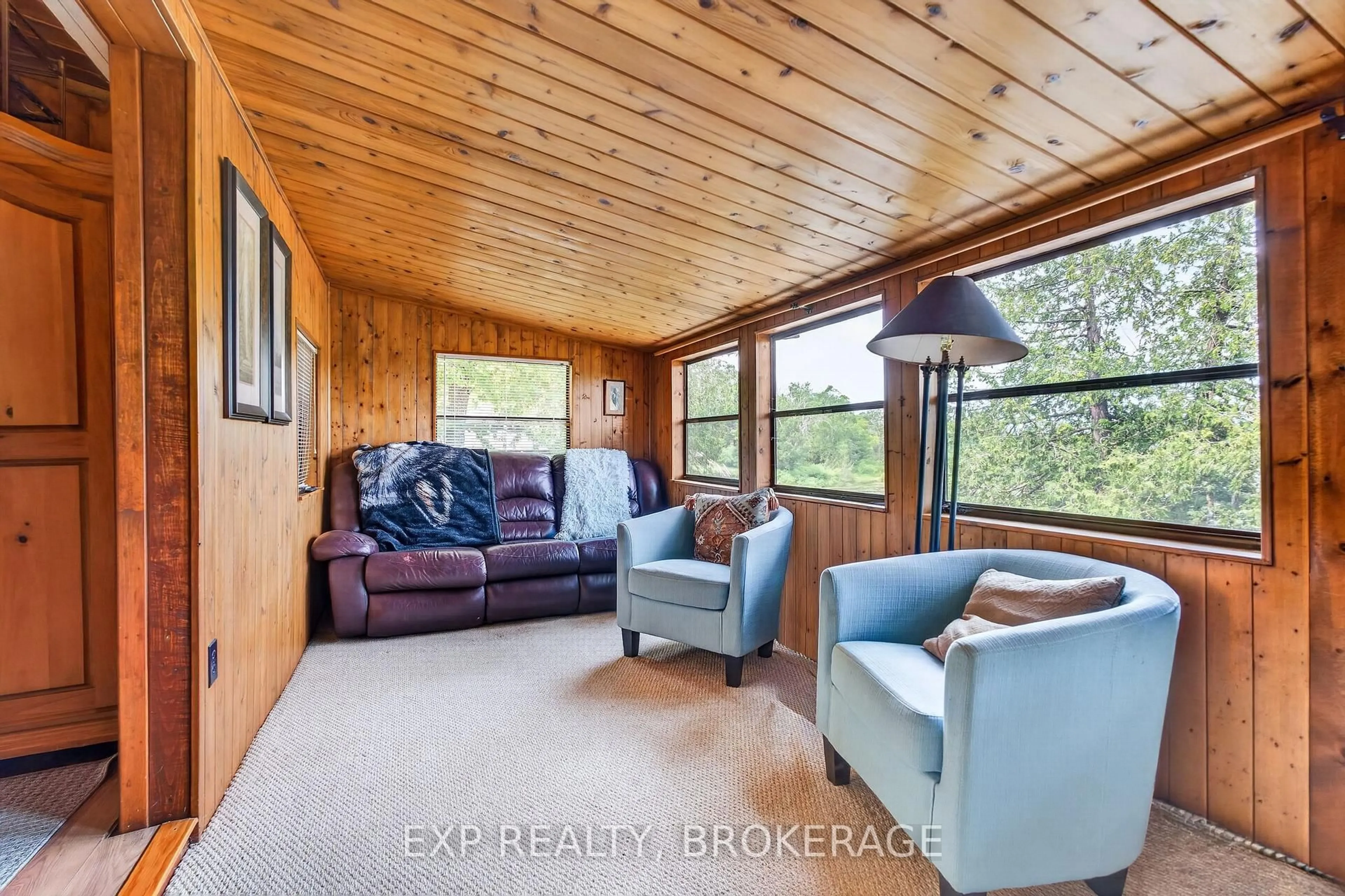Living room with furniture, wood/laminate floor for 88 CANAL Rd, Trent Hills Ontario K0L 1L0