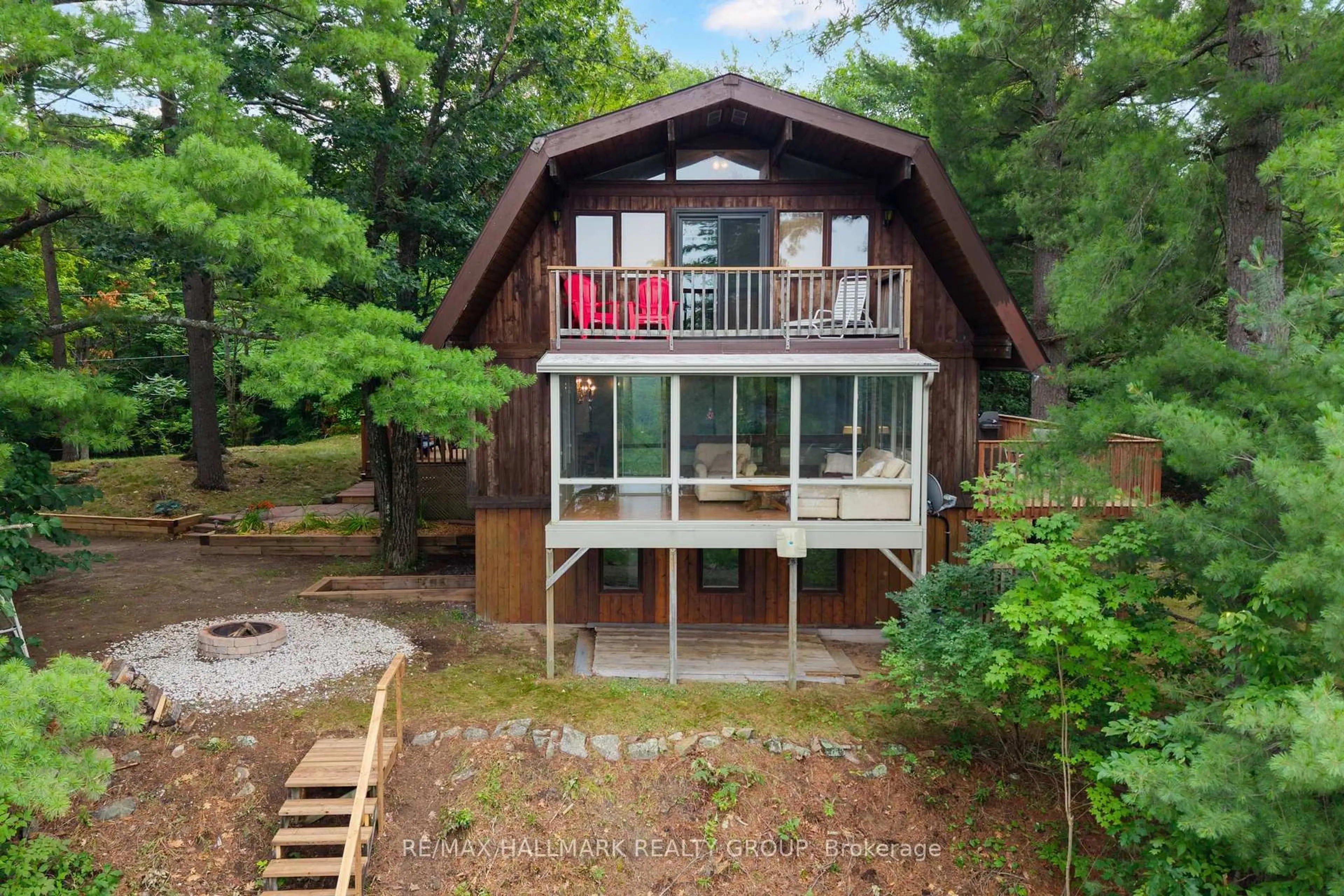 A pic from outside/outdoor area/front of a property/back of a property/a pic from drone, water/lake/river/ocean view for 117 Birch Bay Lane, Perth Ontario K7H 3C9