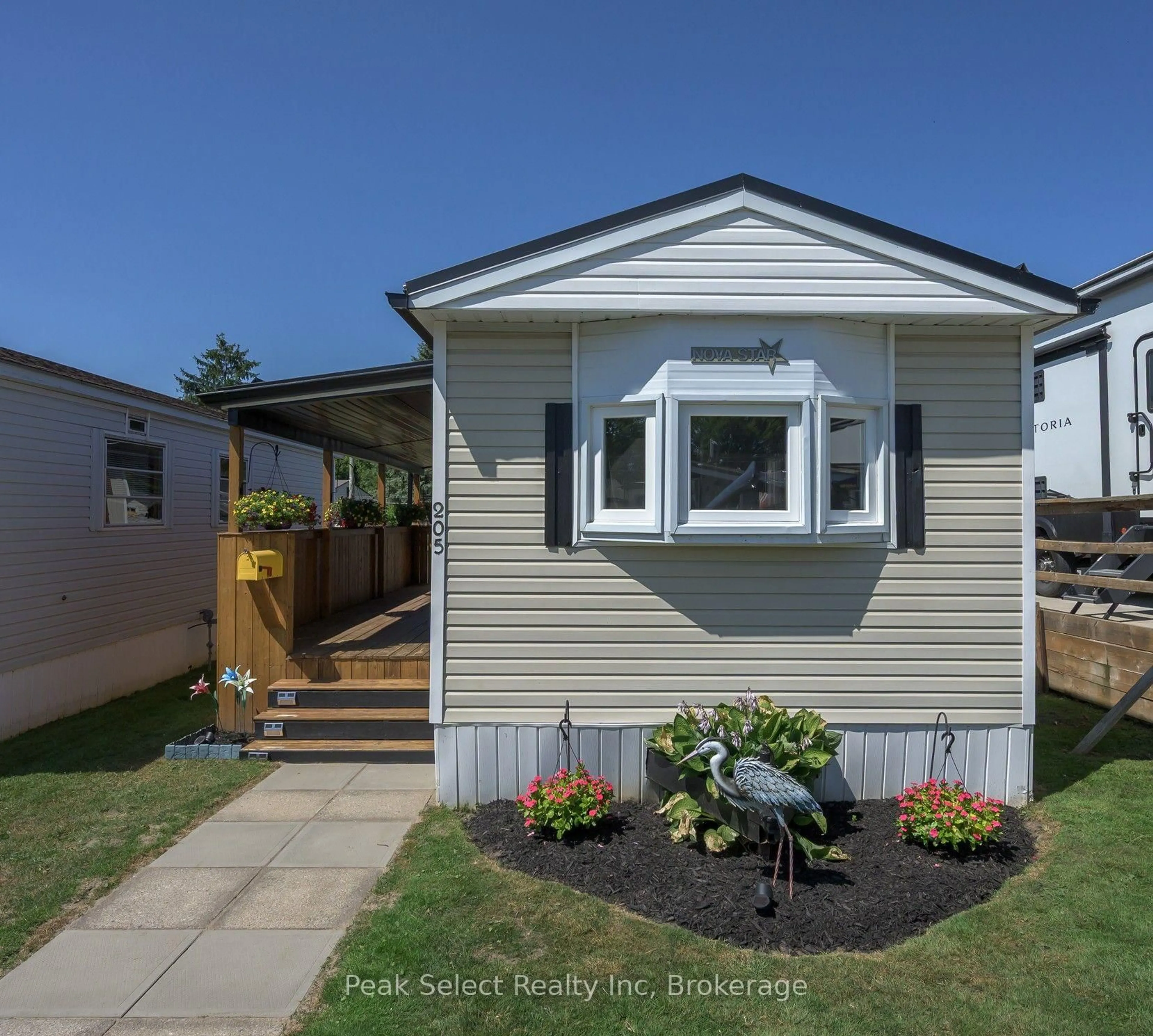 Home with vinyl exterior material, street for 198 Springbank Dr #205, London South Ontario N6J 1G1