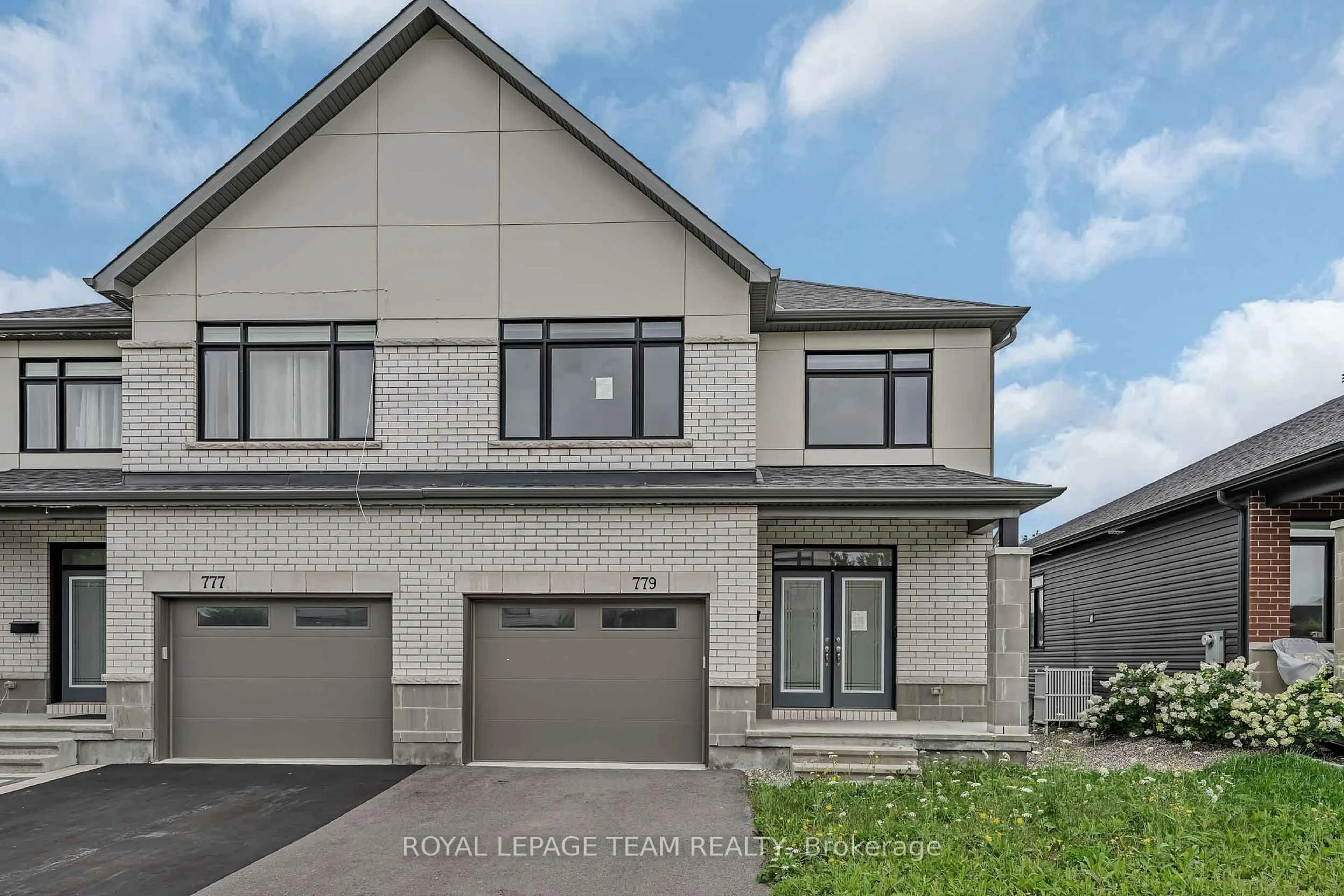 Home with brick exterior material, street for 779 Ovation Grve, Ottawa Ontario K1T 0X6