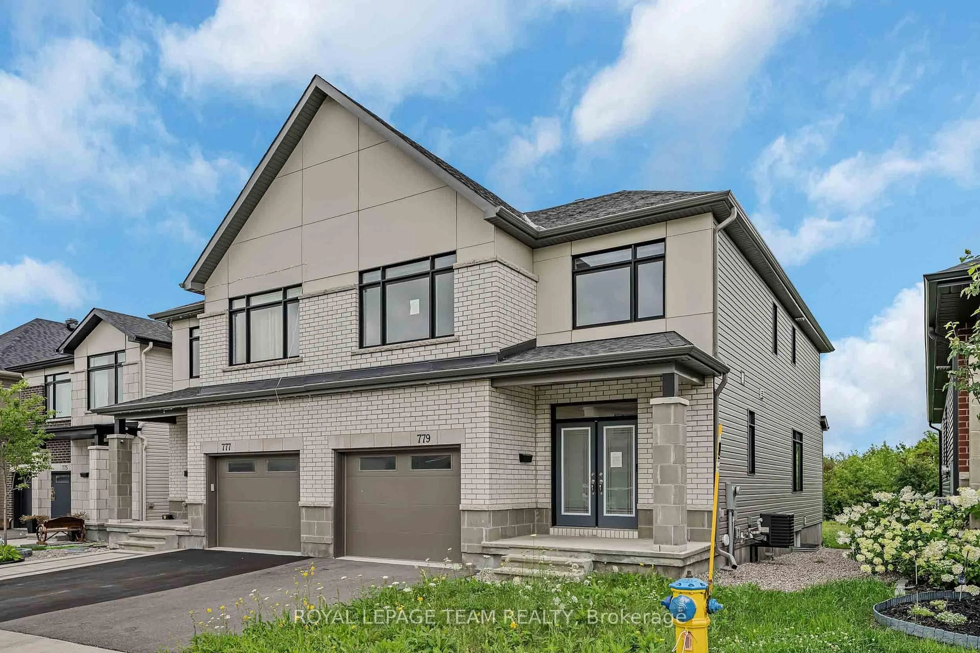 Home with brick exterior material, street for 779 Ovation Grve, Ottawa Ontario K1T 0X6