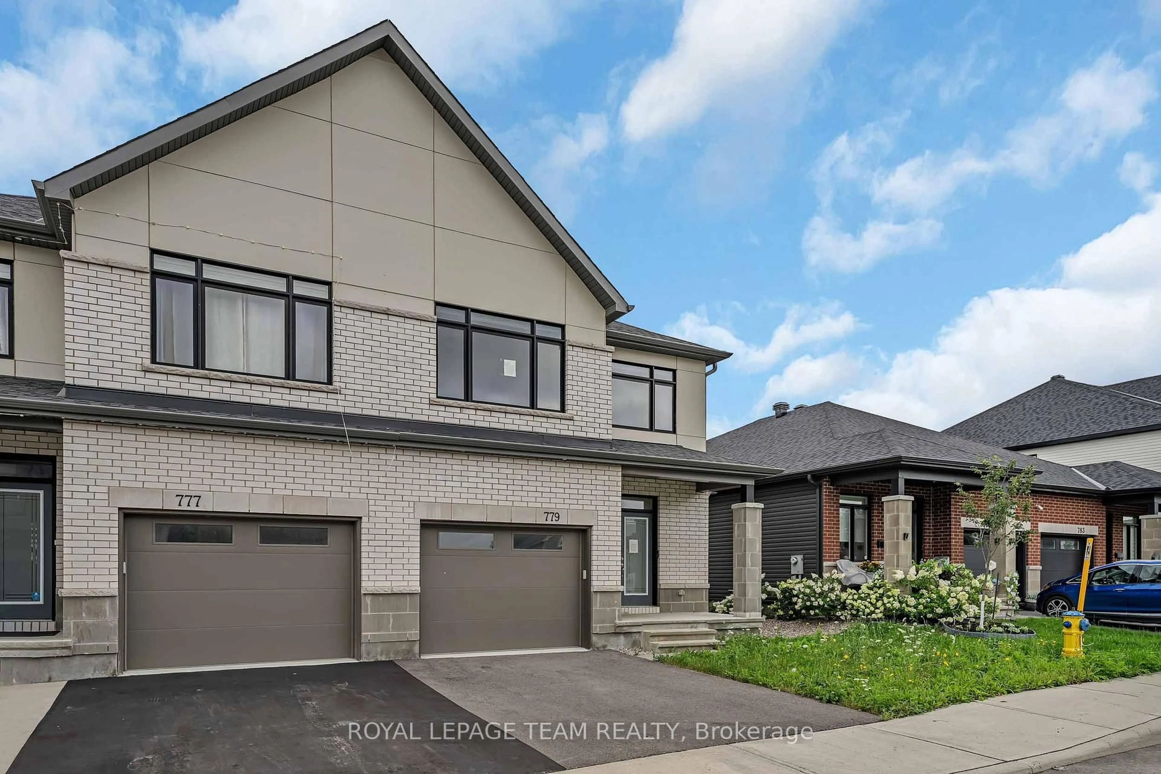 Home with brick exterior material, street for 779 Ovation Grve, Ottawa Ontario K1T 0X6