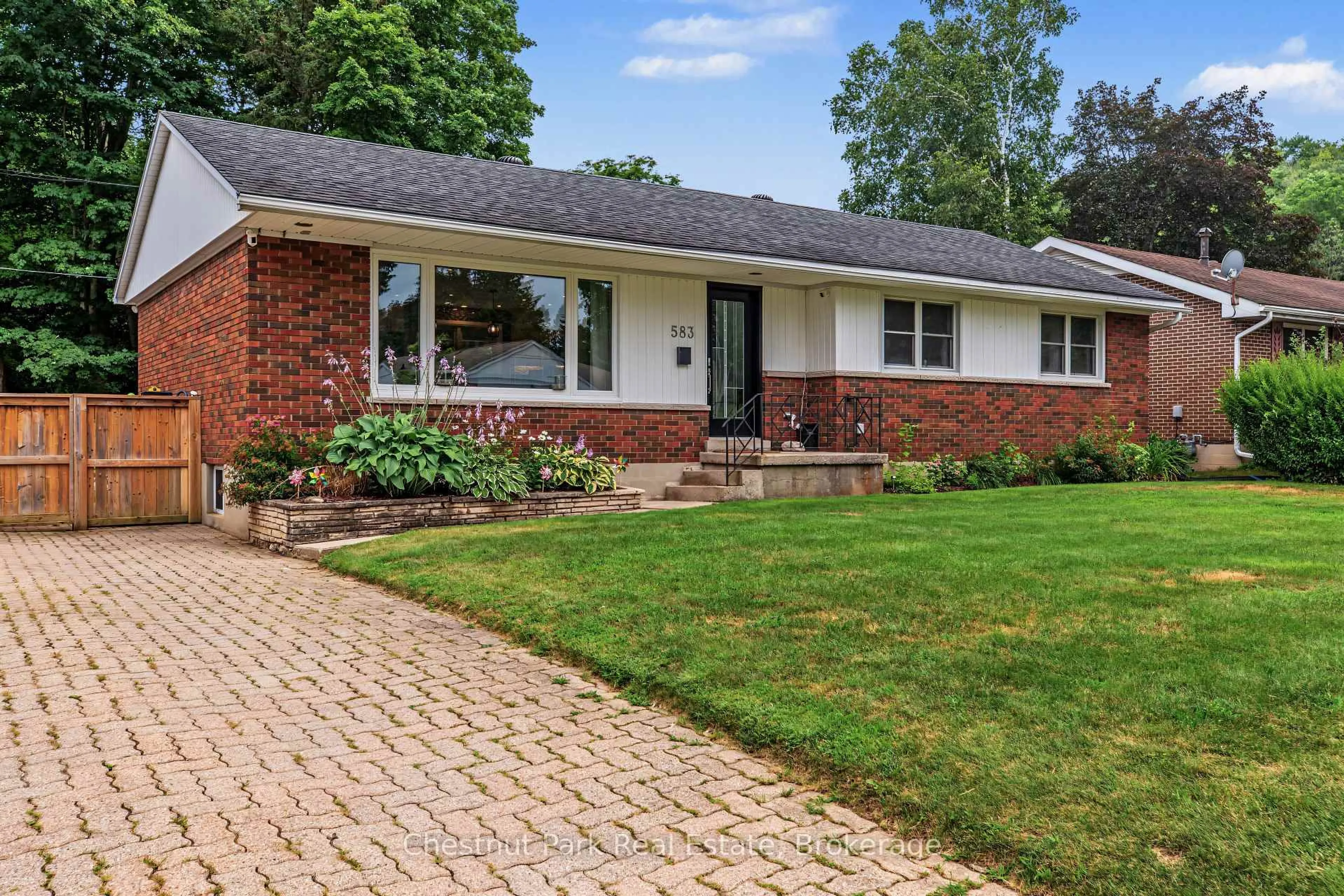 Home with brick exterior material, street for 583 6th St, Owen Sound Ontario N4K 3L2