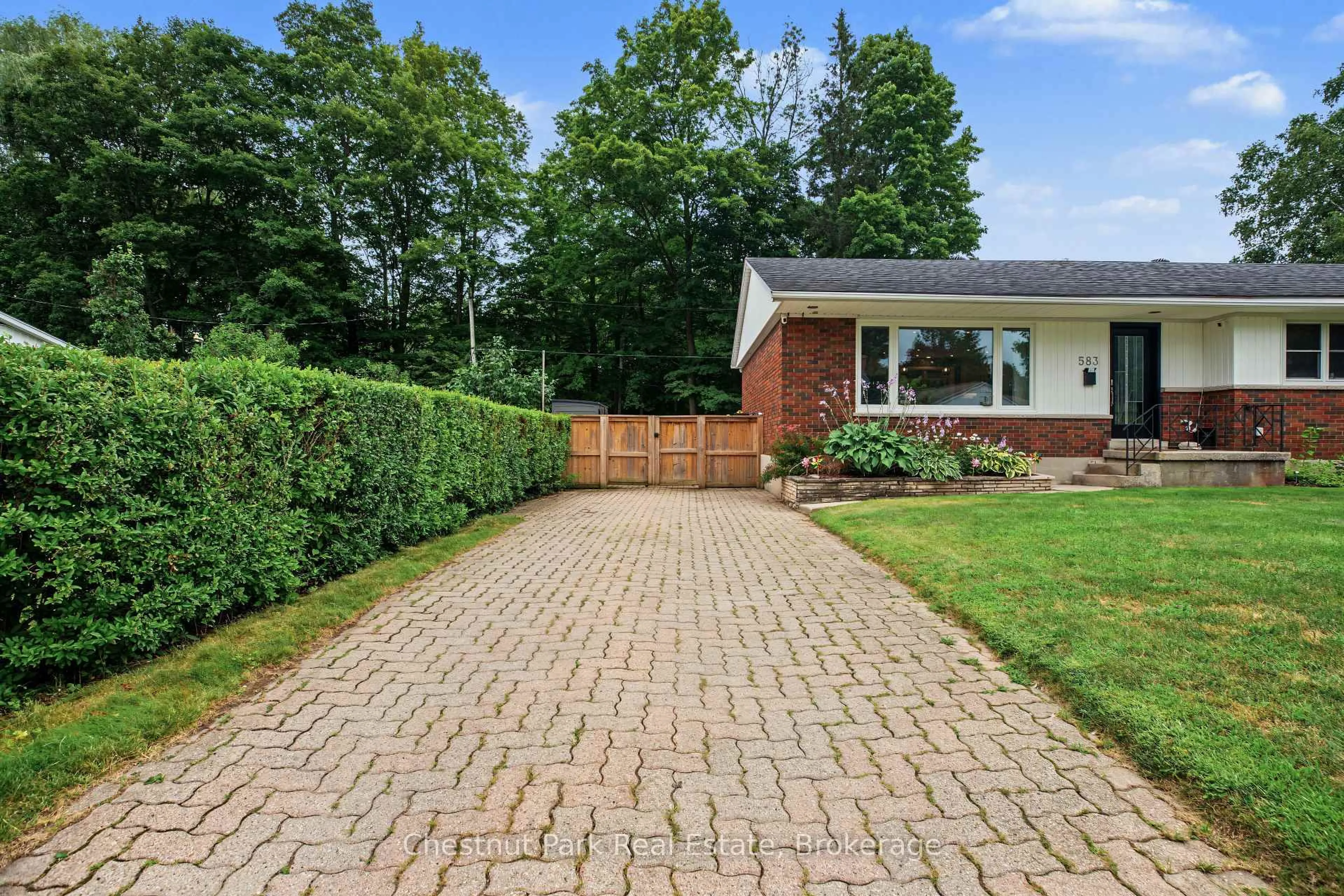 Home with brick exterior material, street for 583 6th St, Owen Sound Ontario N4K 3L2