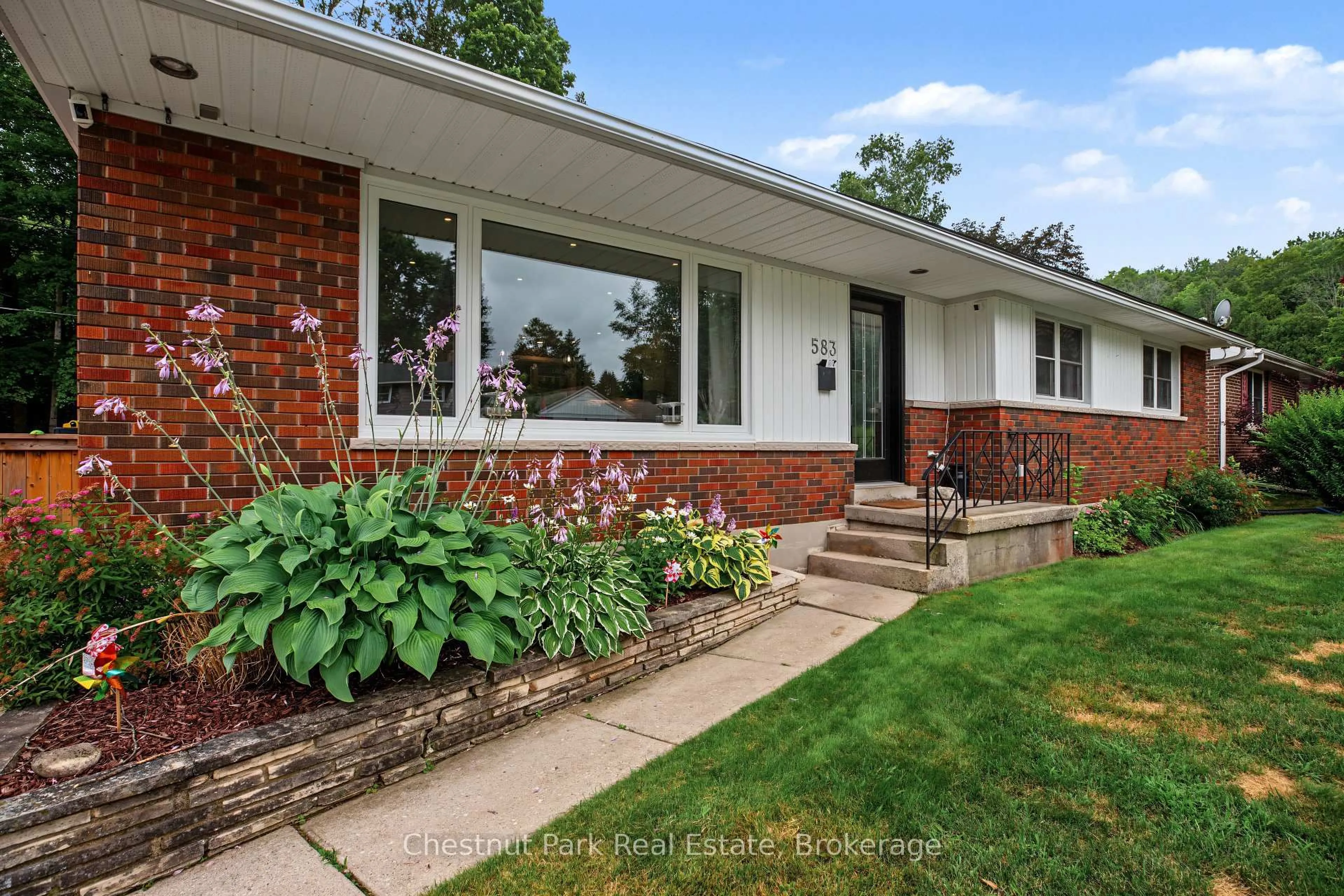 Home with brick exterior material, street for 583 6th St, Owen Sound Ontario N4K 3L2