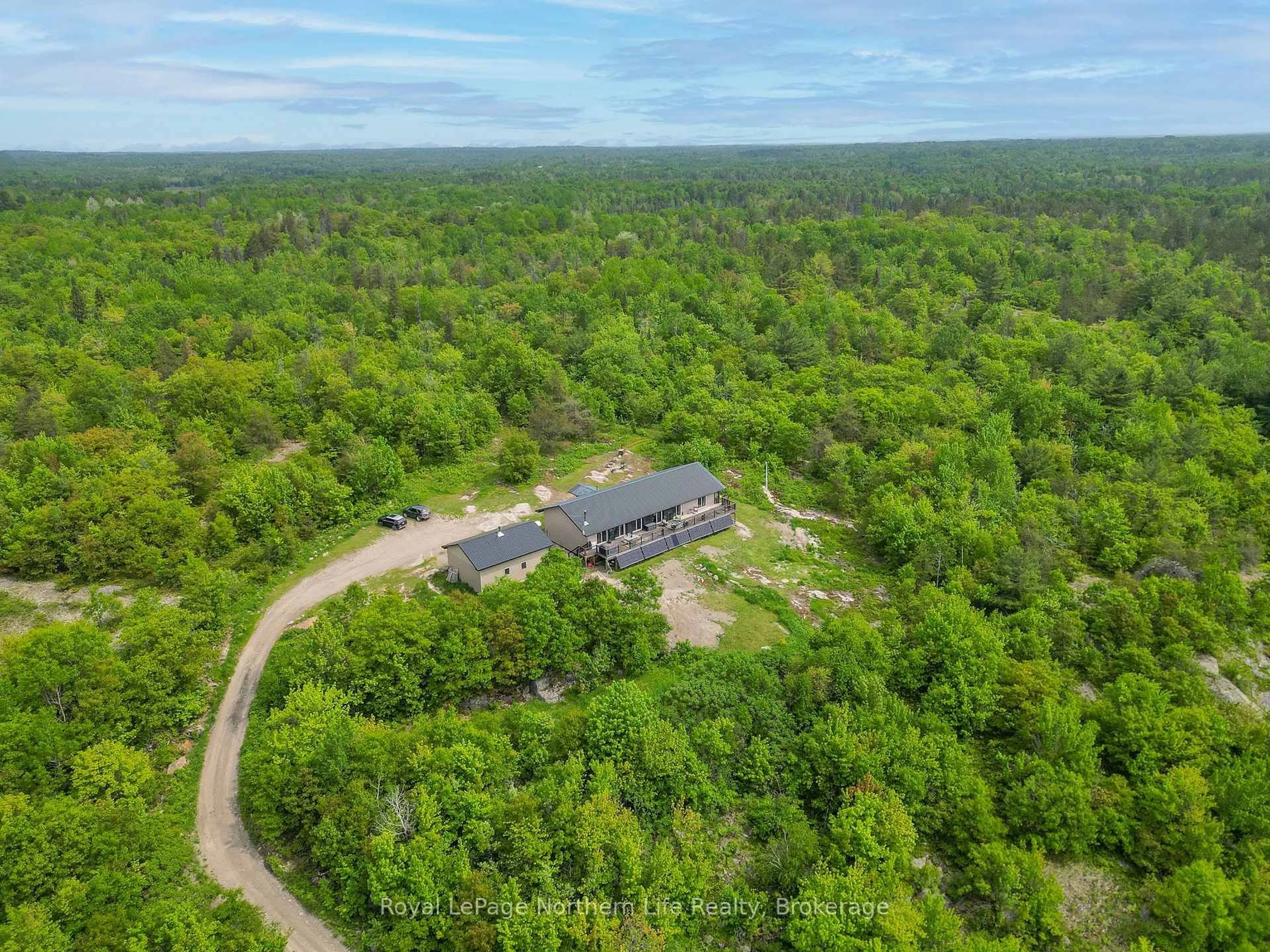 A pic from outside/outdoor area/front of a property/back of a property/a pic from drone, forest/trees view for 11327 Highway 17, West Nipissing Ontario P0H 1G0