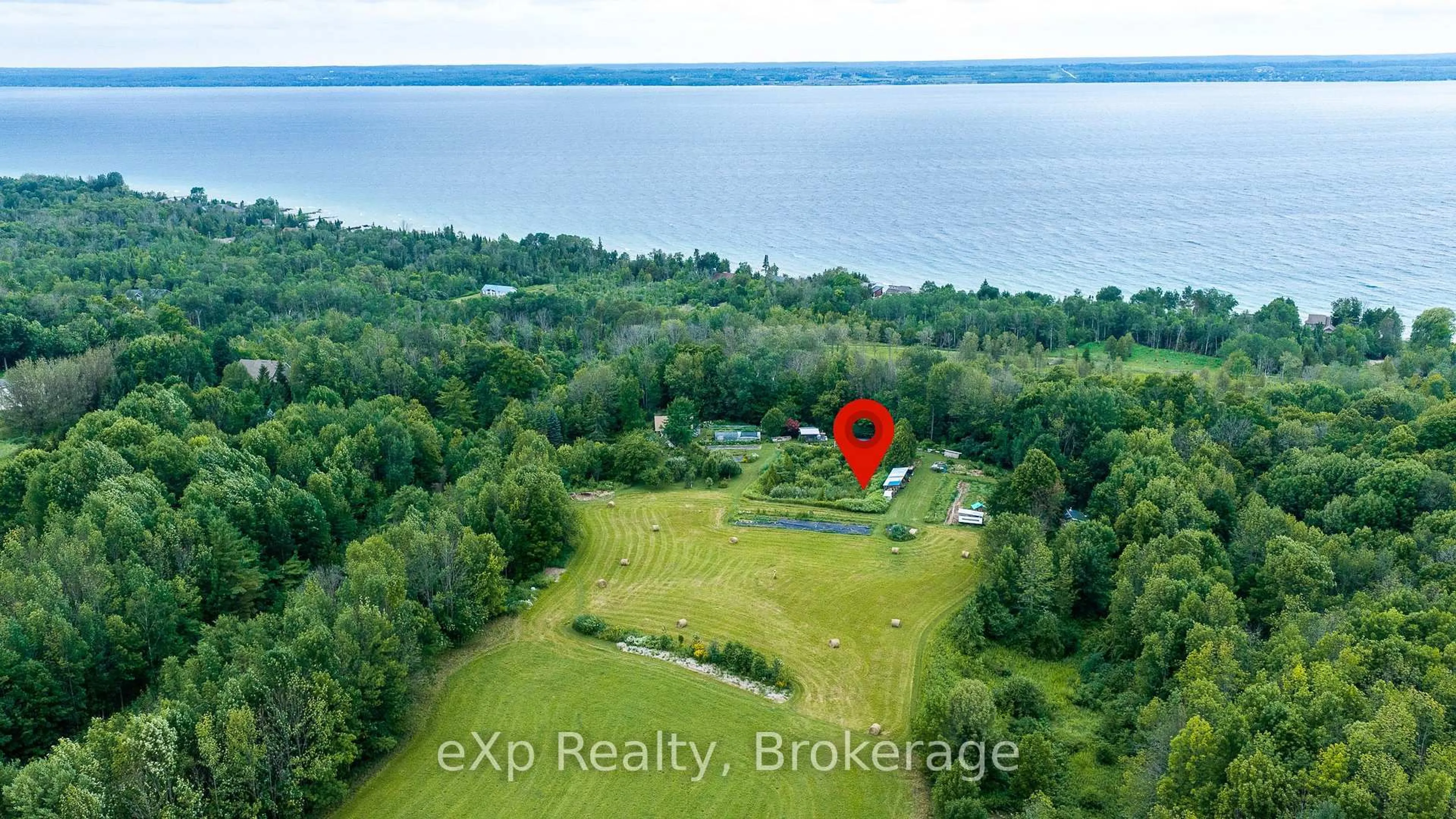 A pic from outside/outdoor area/front of a property/back of a property/a pic from drone, water/lake/river/ocean view for 350063 Bayshore Rd, Meaford Ontario N0H 1B0