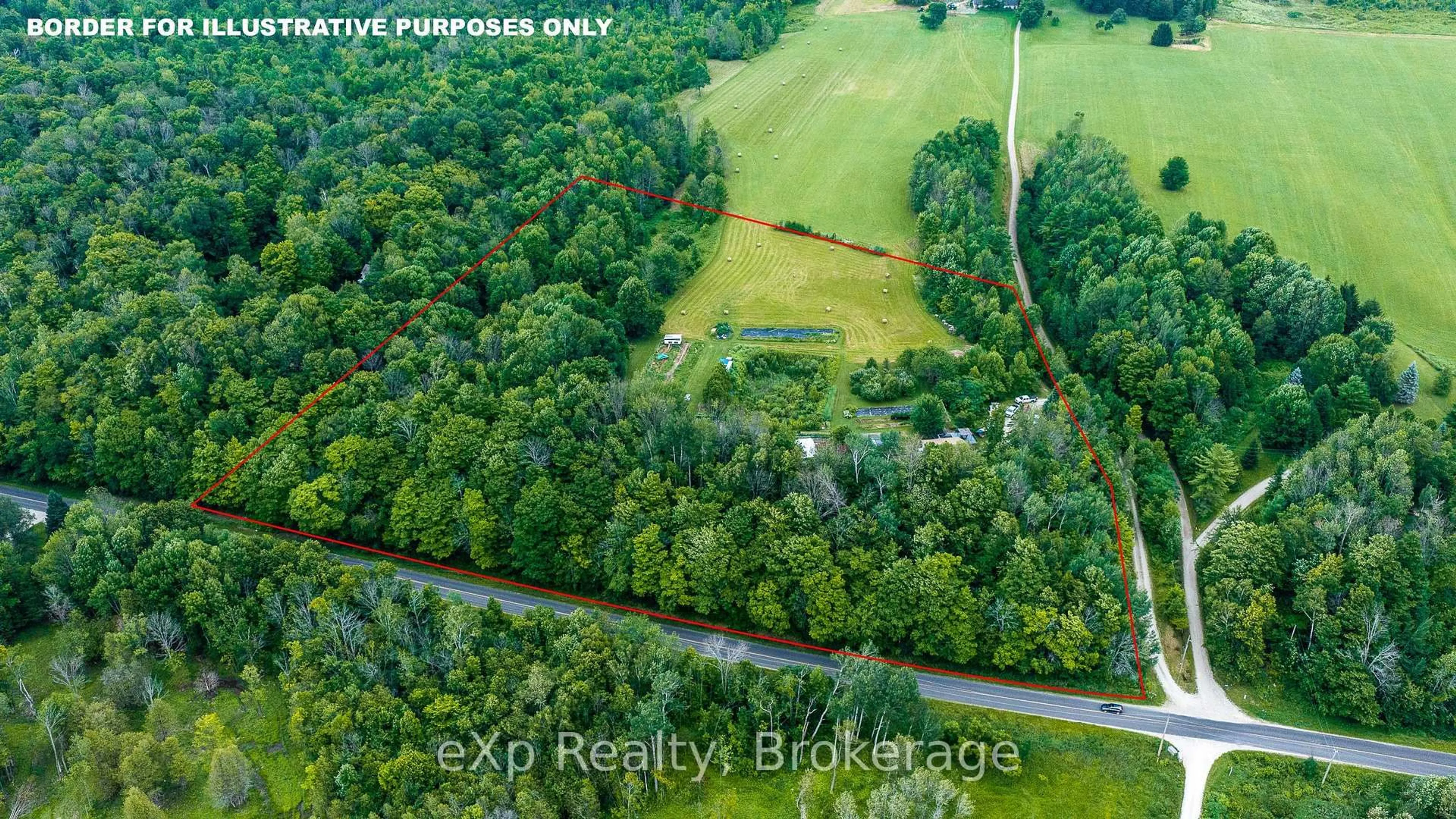 A pic from outside/outdoor area/front of a property/back of a property/a pic from drone, forest/trees view for 350063 Bayshore Rd, Meaford Ontario N0H 1B0