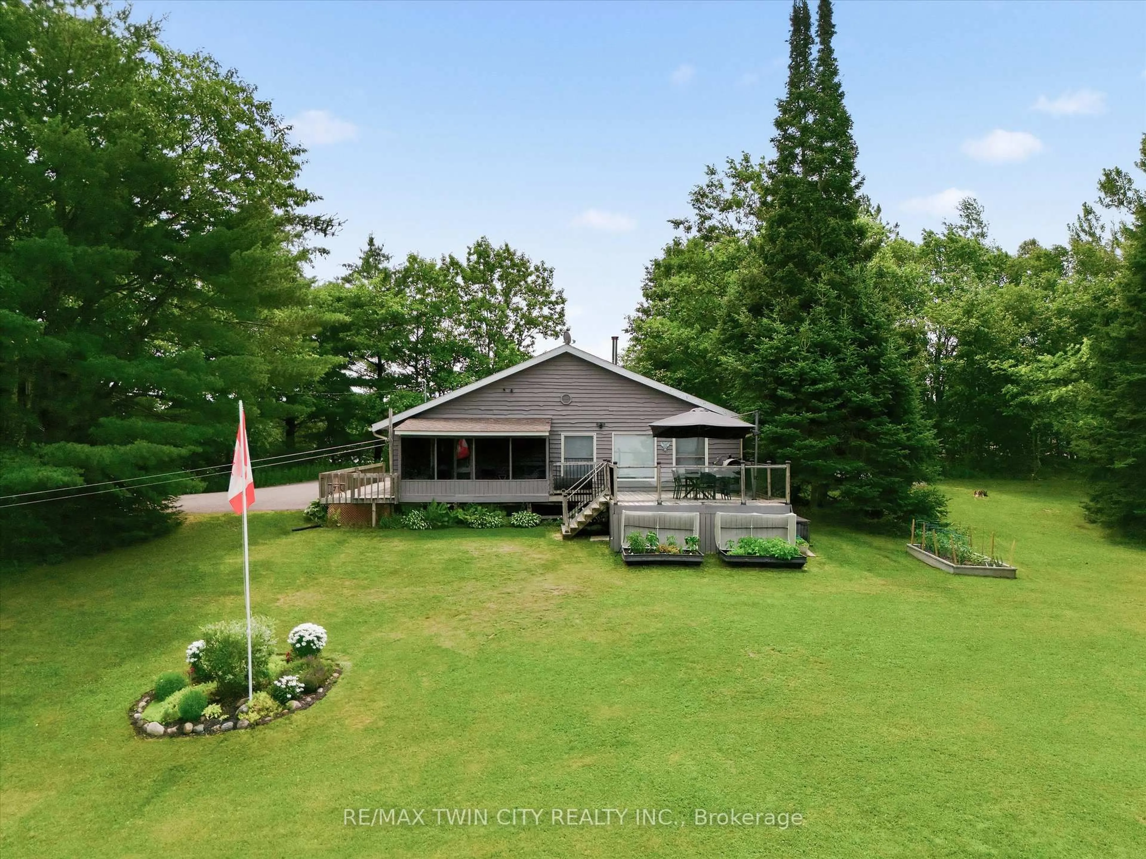 A pic from outside/outdoor area/front of a property/back of a property/a pic from drone, water/lake/river/ocean view for 51 Mckellar Lake Rd, McKellar Ontario P0G 1C0