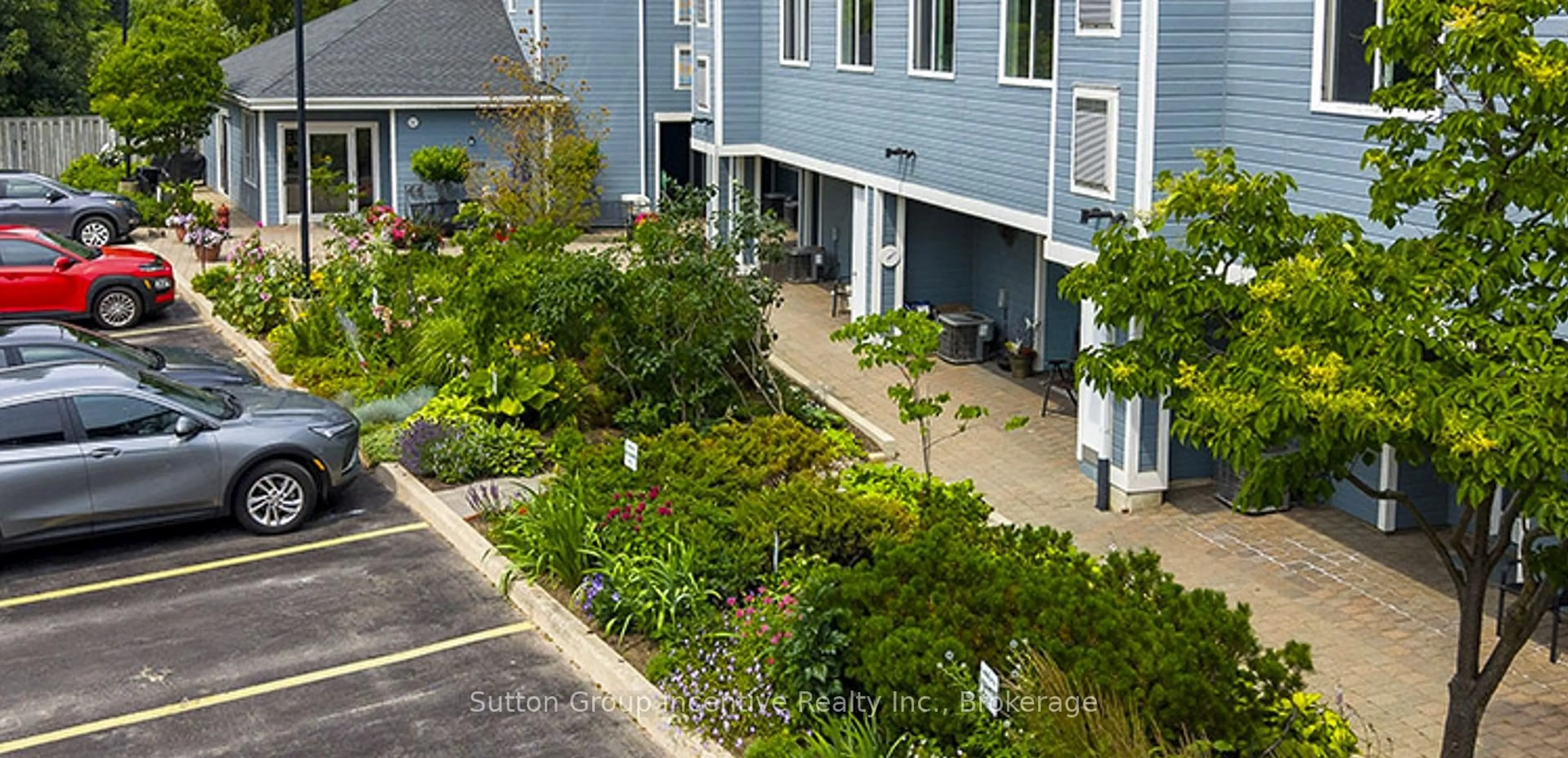 A pic from outside/outdoor area/front of a property/back of a property/a pic from drone, street for 34 Bayfield St #404, Meaford Ontario N4L 1Y2